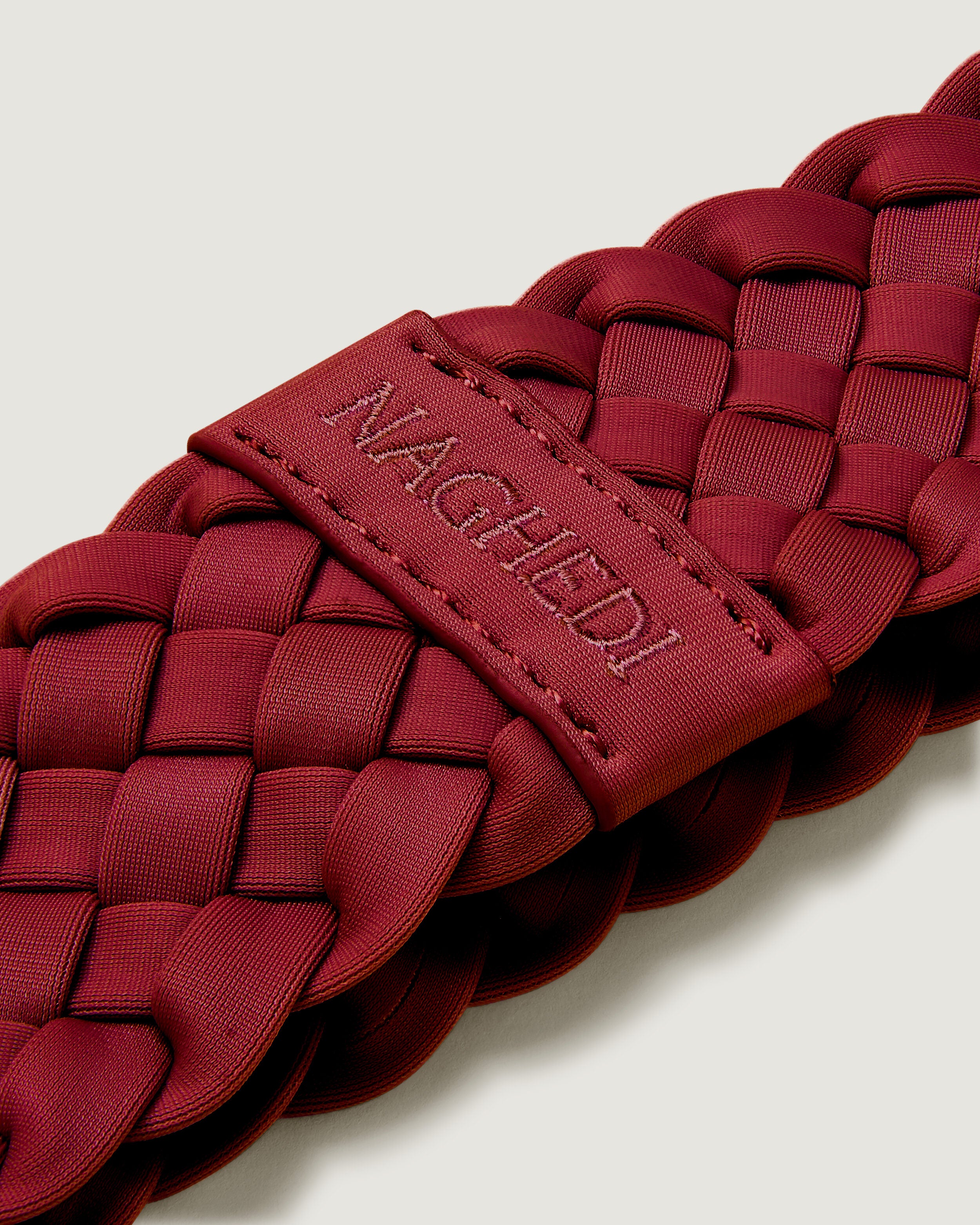 Close-up of handwoven detailing on Rivage Headband in Rosso.