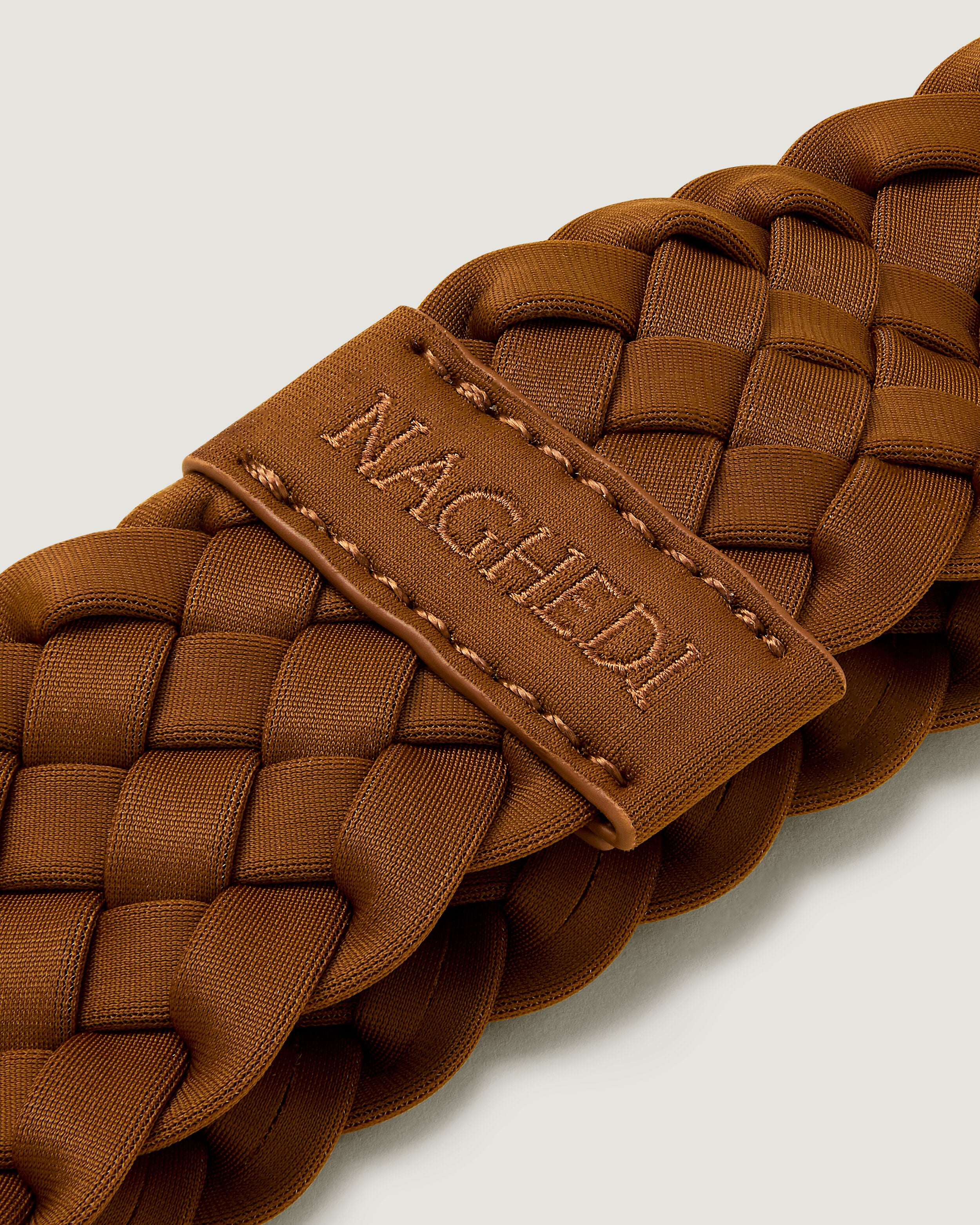 Close-up of handwoven detailing on Rivage Headband in Teak.