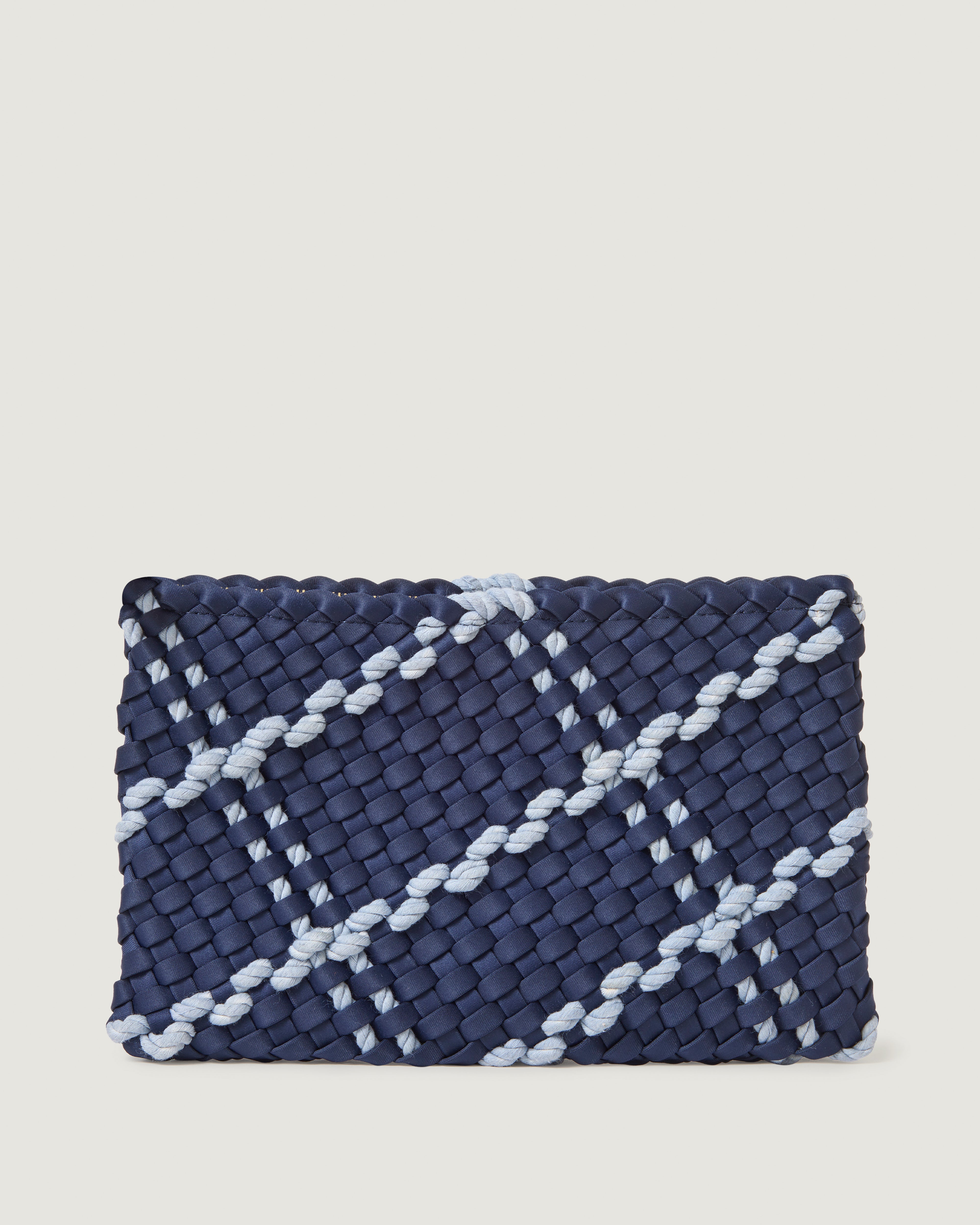 Salina Pouch in Coast, a navy blue tone, in handwoven neoprene, featuring a zip closure and rope detailing.