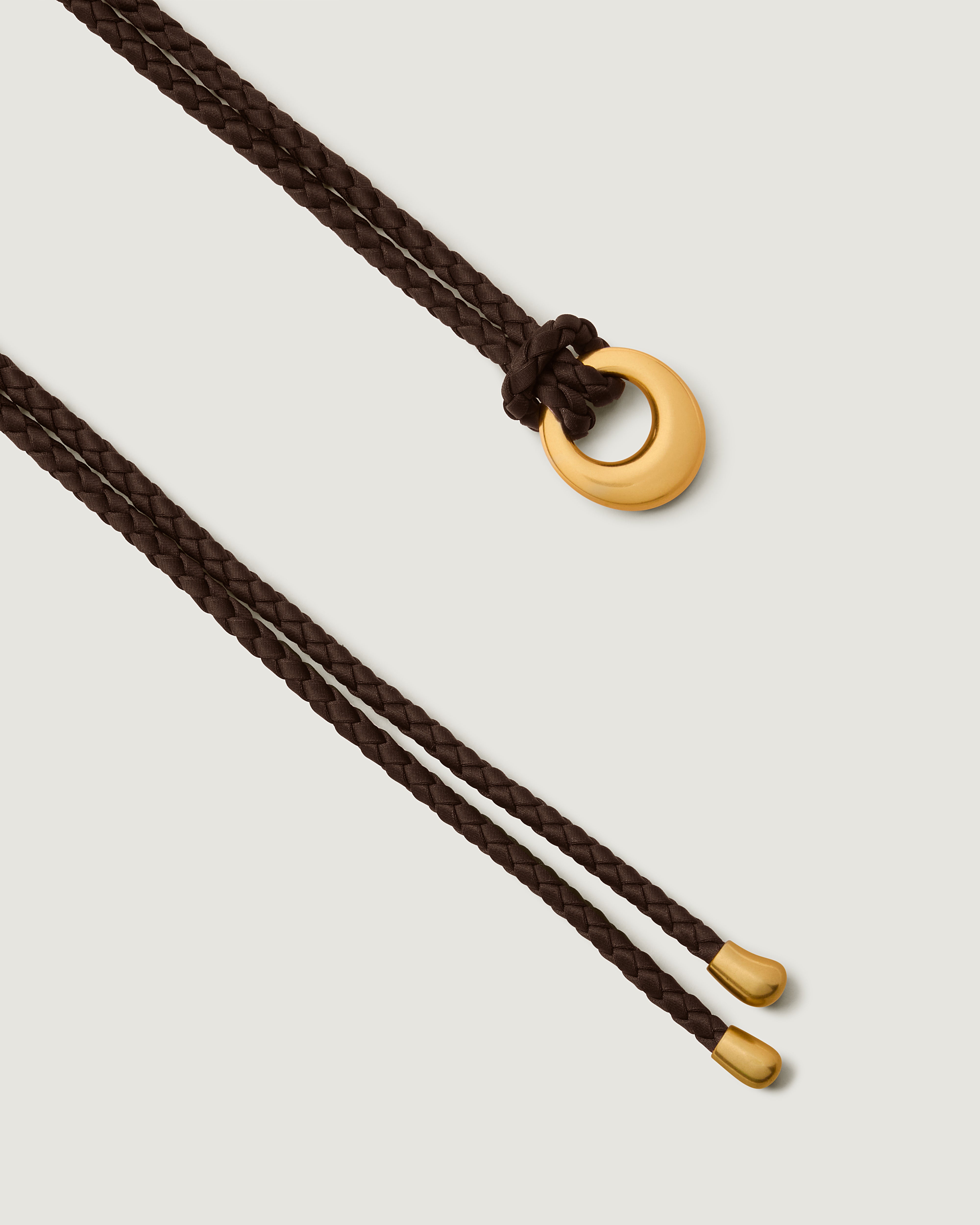 Salta Belt in Chocolate featuring custom brushed metal hardware.