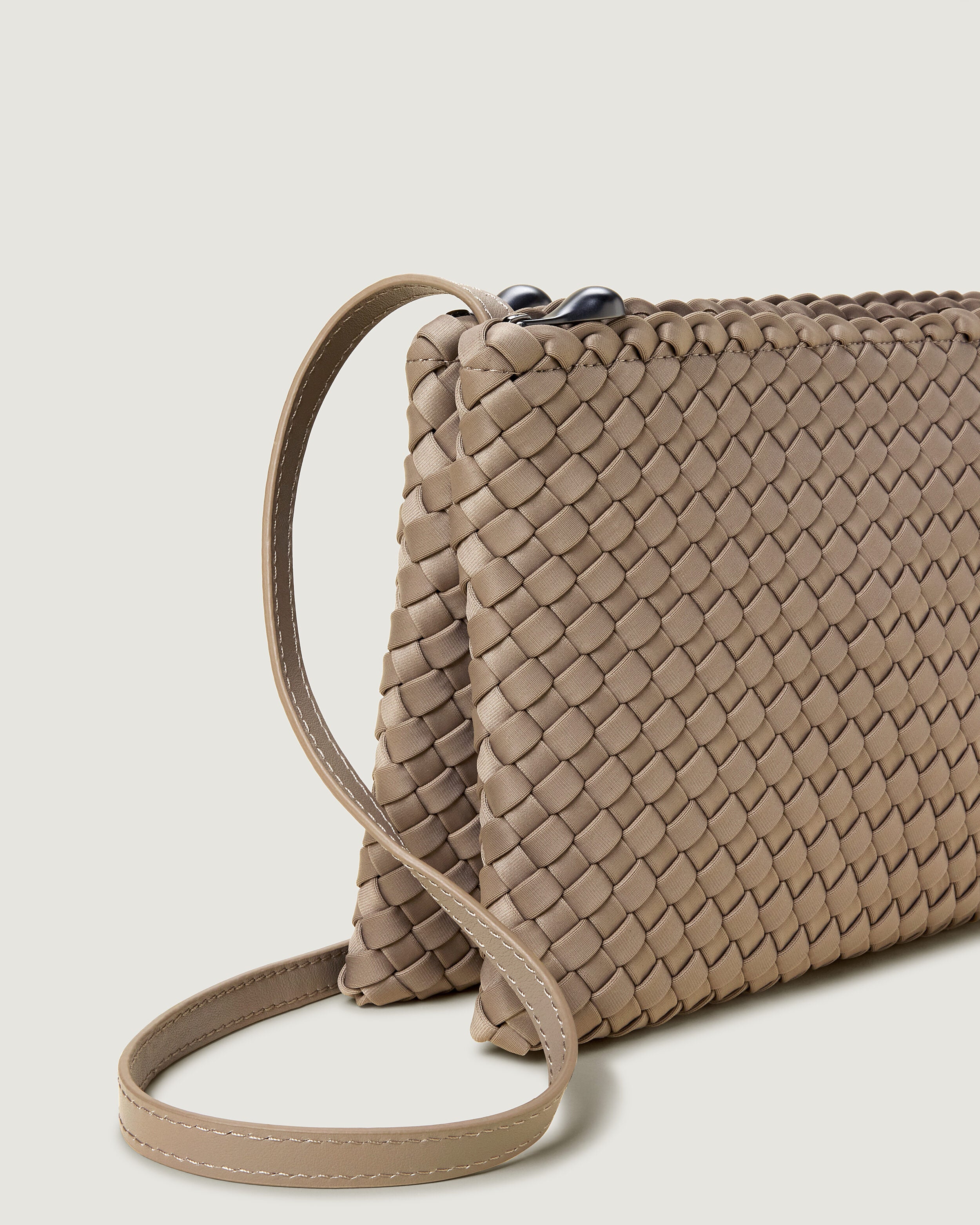 Close-up of handwoven detailing on Soho Envelope in Cashmere.