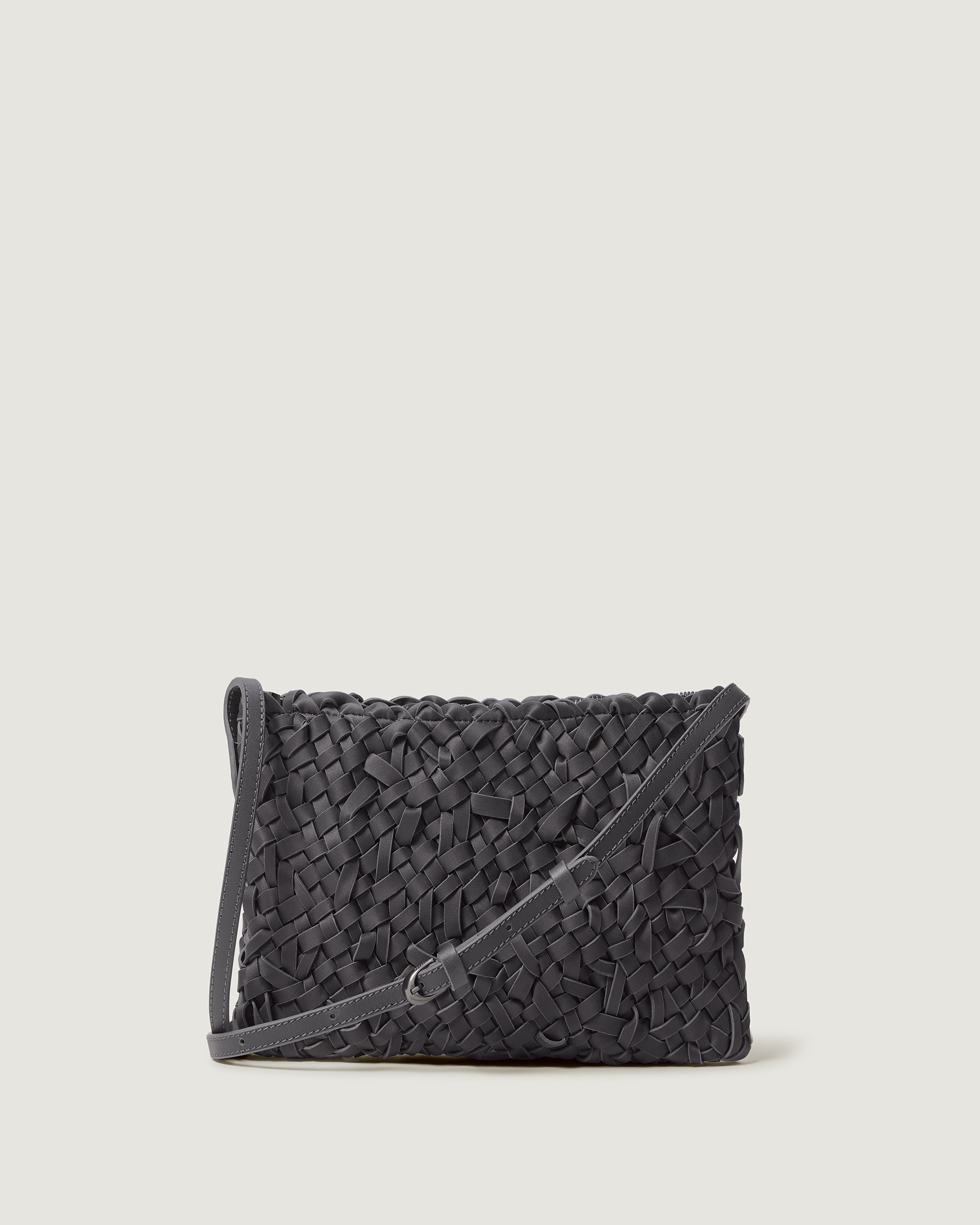 Handwoven neoprene crossbody bag in ash gray color in a crosshatch nest weave pattern