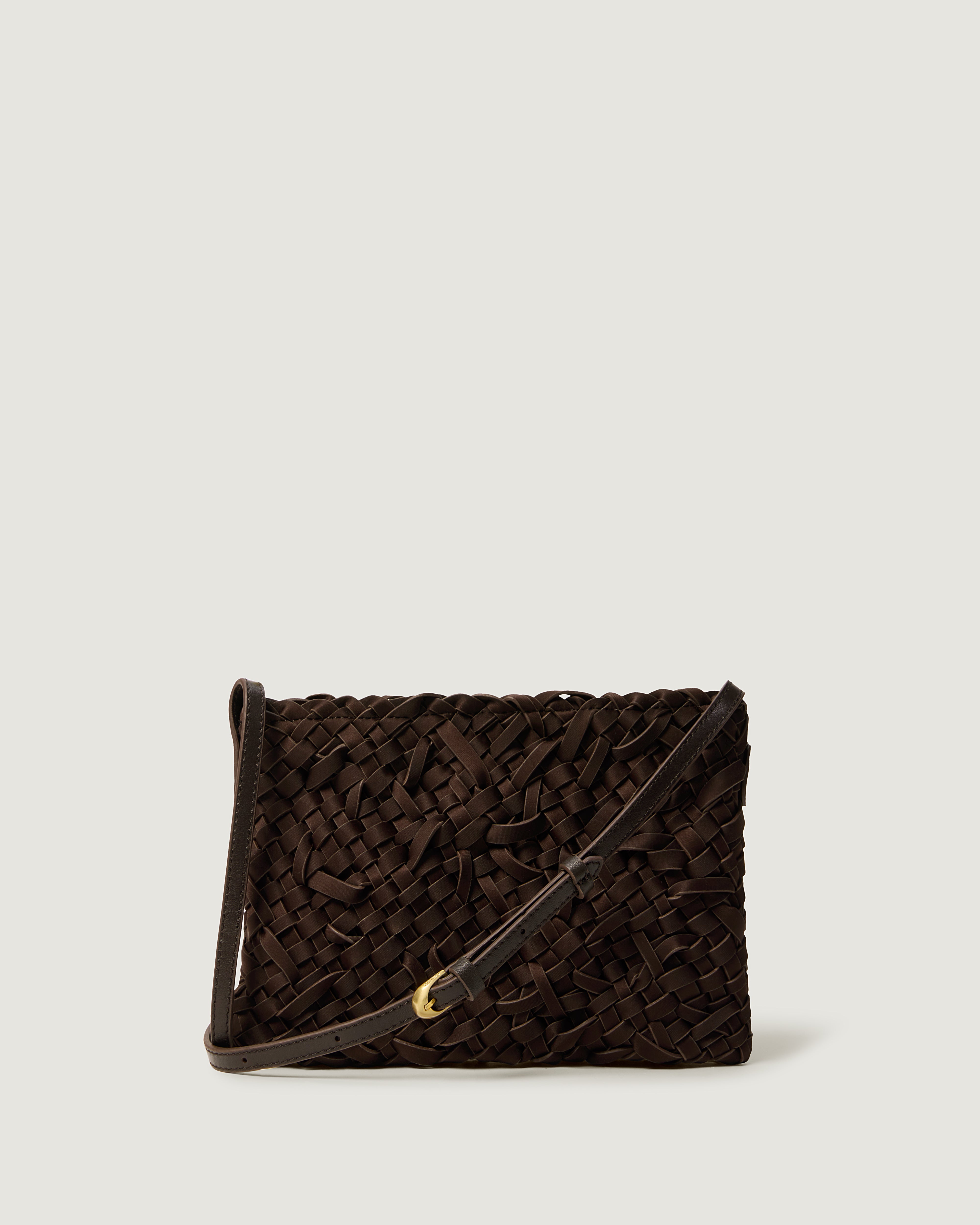 Handwoven neoprene crossbody bag in chocolate brown color in a crosshatch nest weave pattern