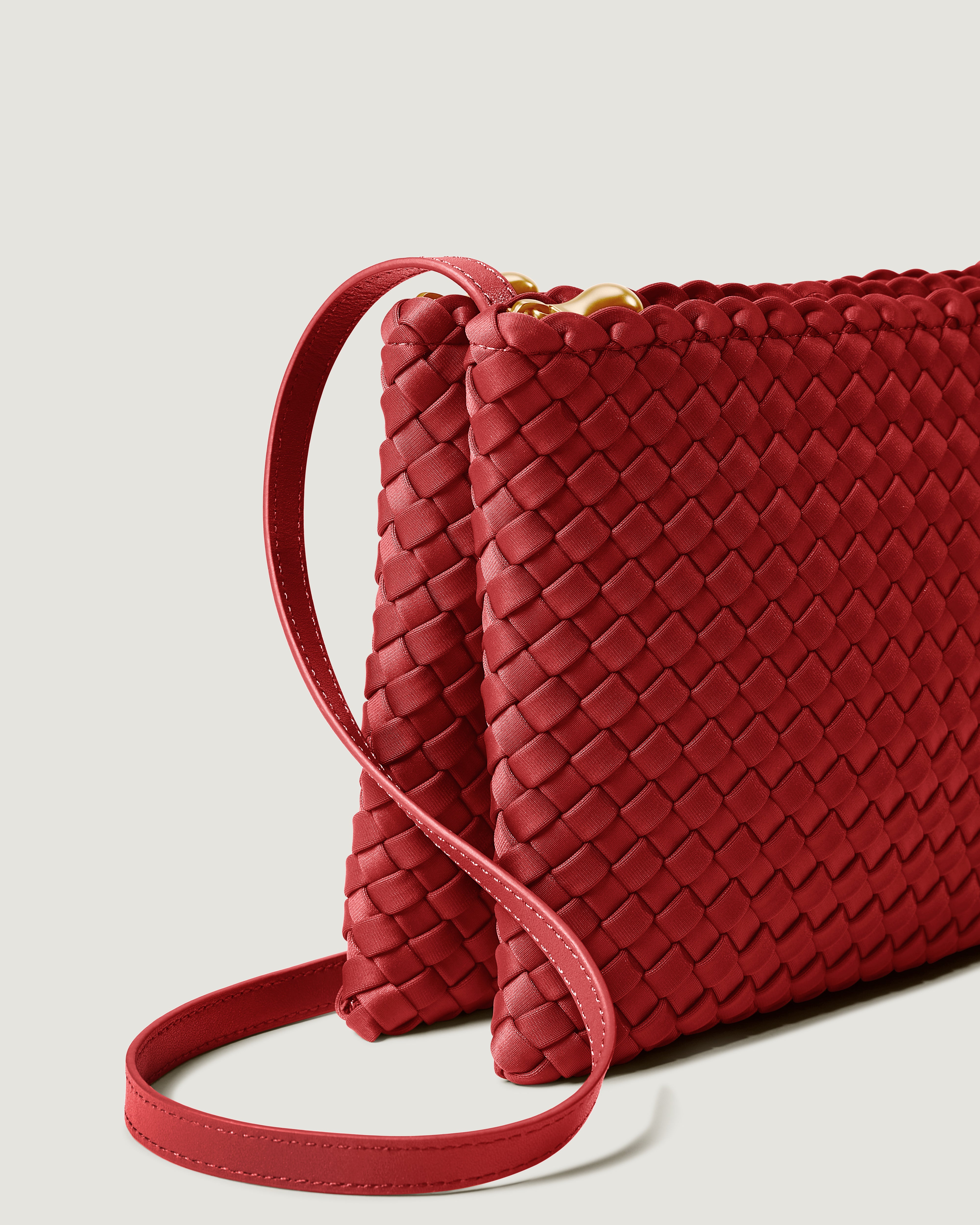 Close-up of handwoven detailing on Soho Envelope in Rosso.