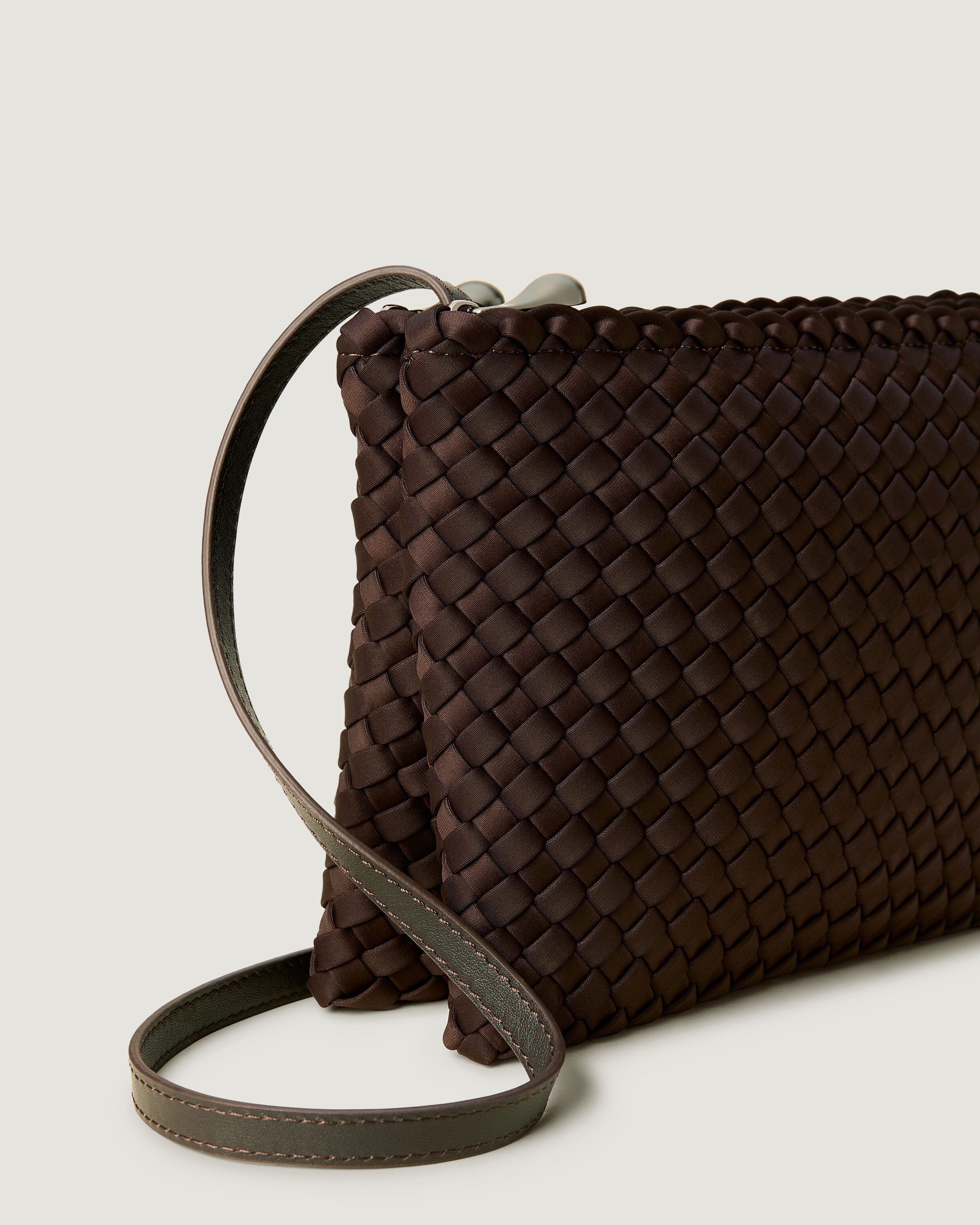 Close-up of handwoven detailing on Soho Envelope in Chocolate.