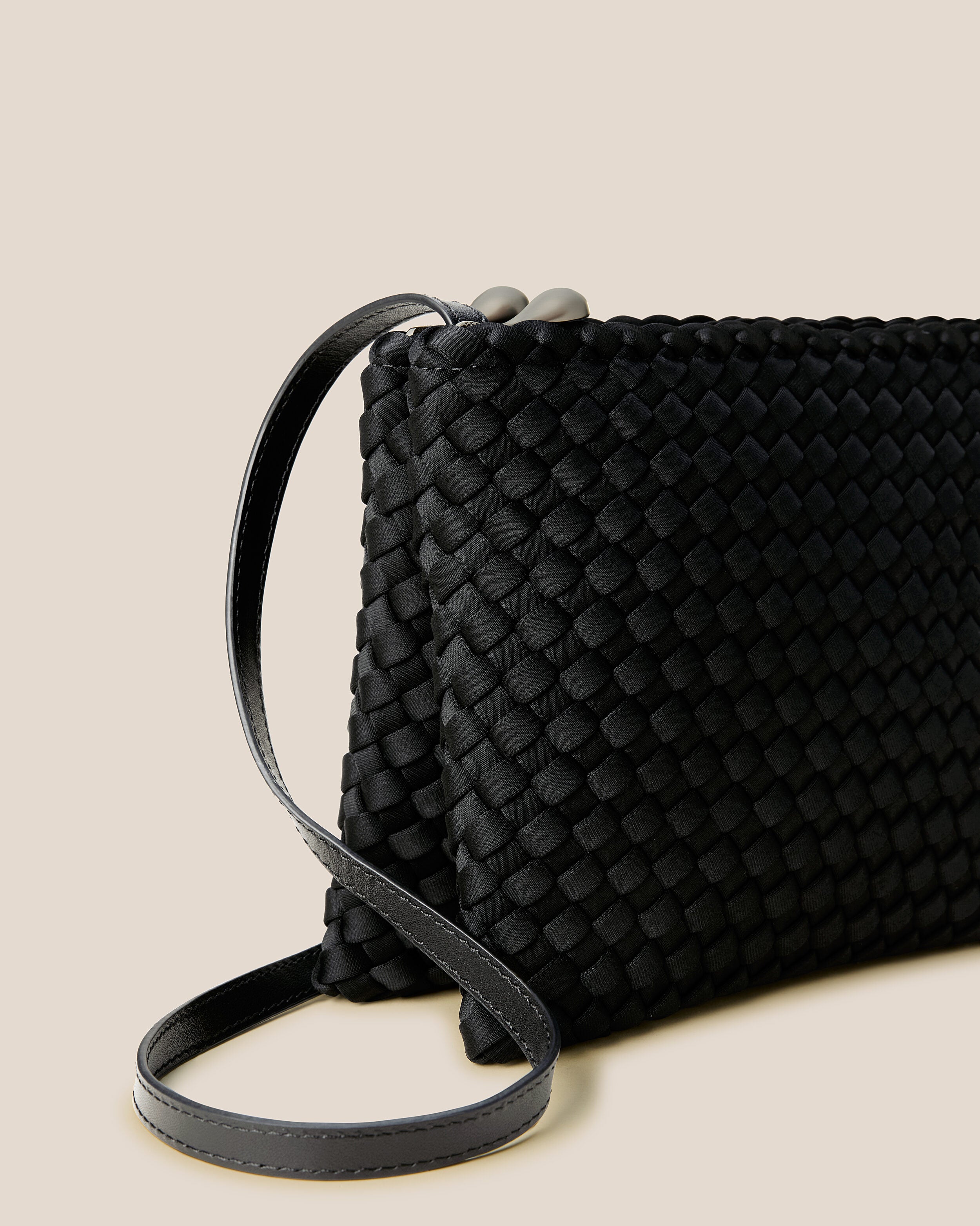 Close-up of handwoven detailing on Soho Envelope in Onyx.