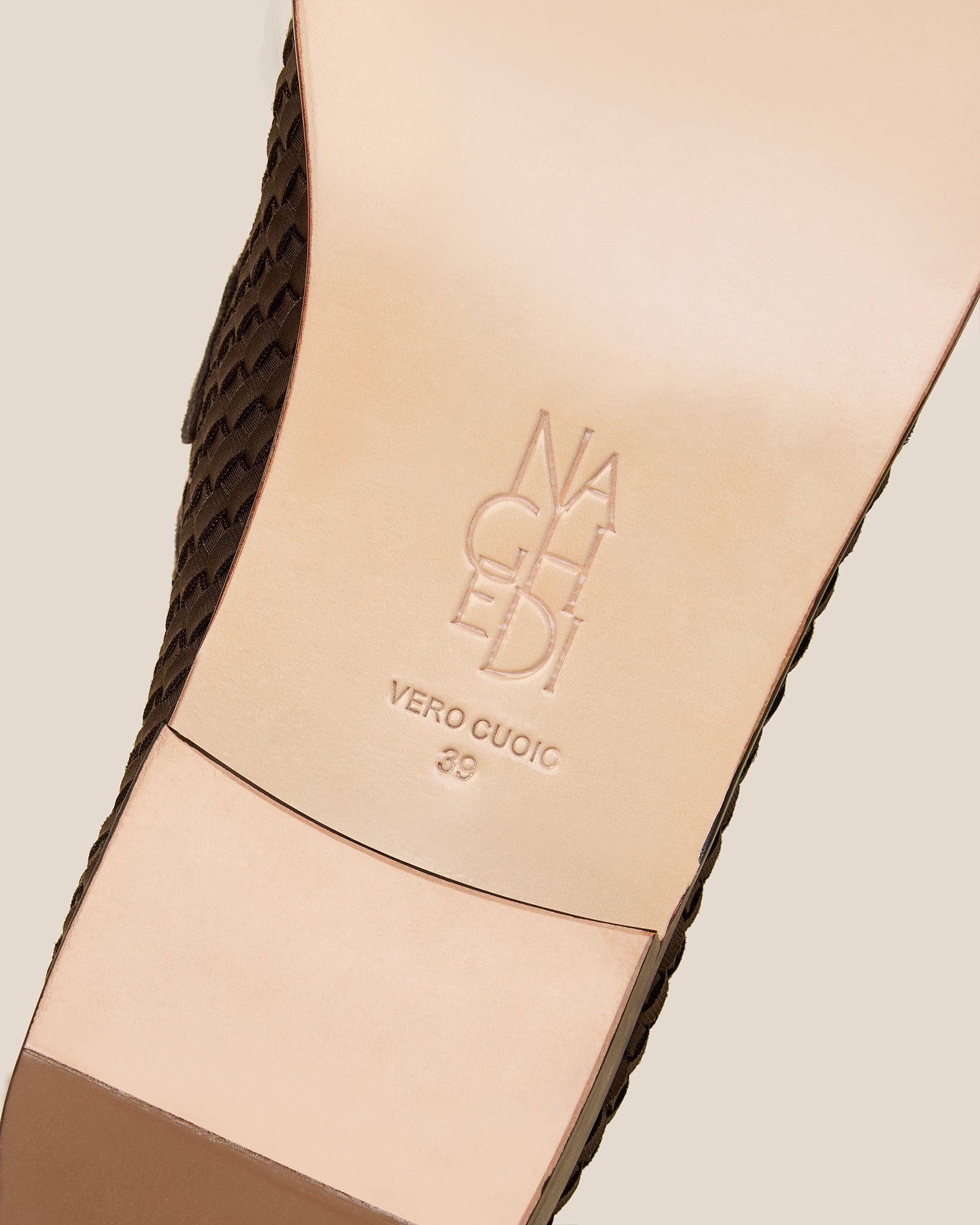 Shoe sole showing stamped NAGHEDI logo and size detail for Sonoma Loafers in Chocolate.