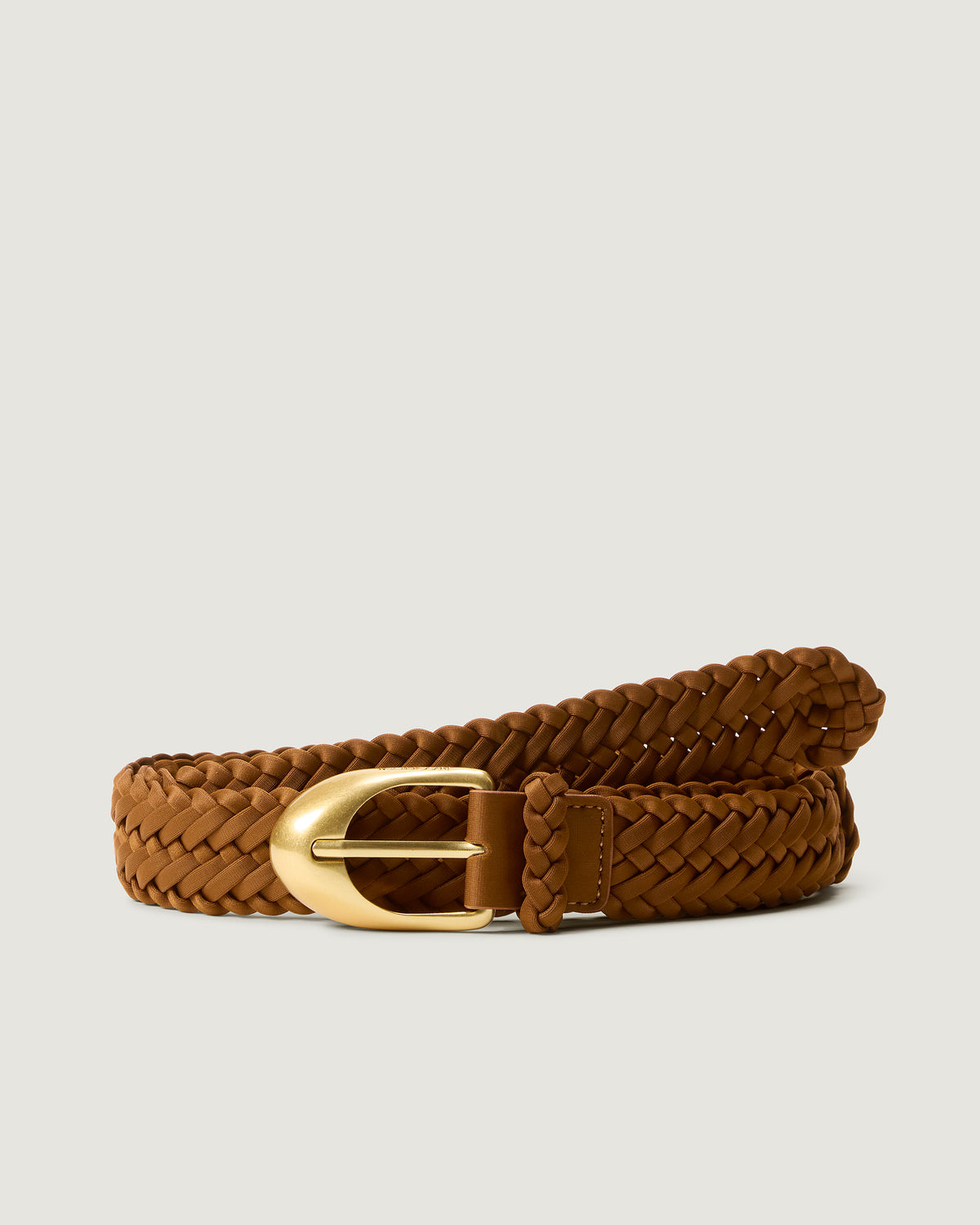 Front view of Sonora Belt in Teak, a handwoven neoprene belt with brushed gold hardware. 