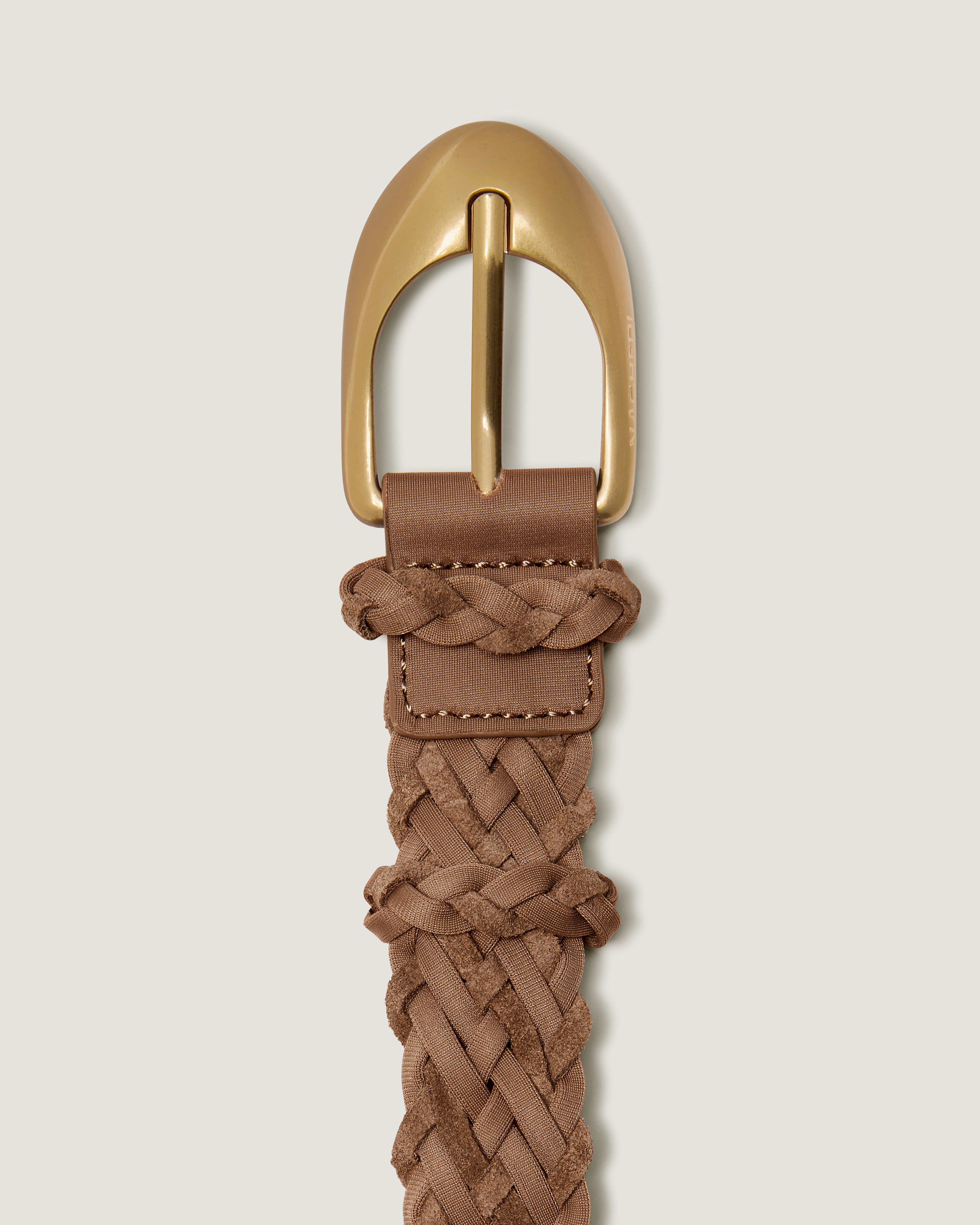 A close-up of the brushed gold buckle on a light brown neoprene and suede braided belt.