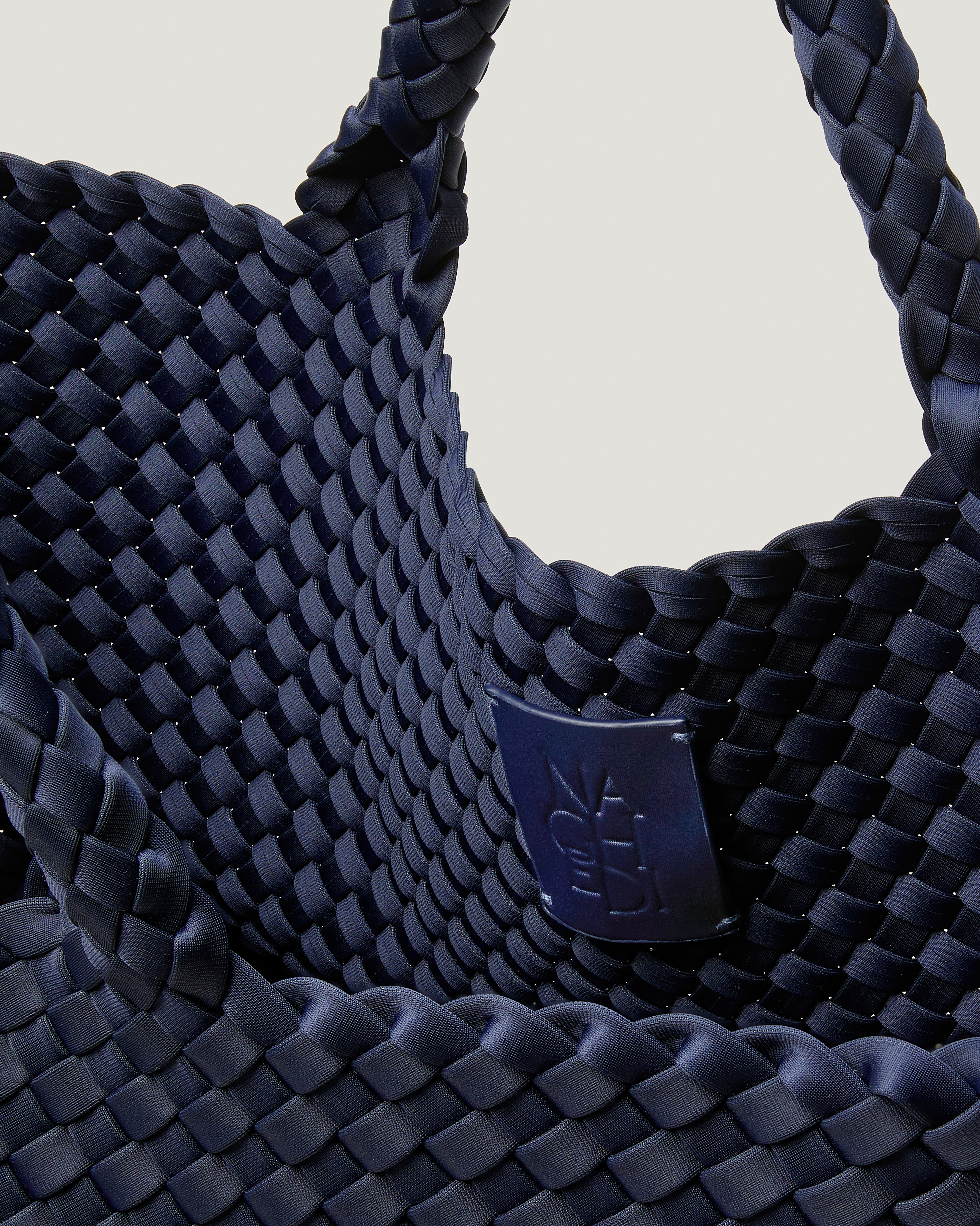 Interior close-up of St. Barths Tote in Ink Blue showing its open top, and unlined interior.