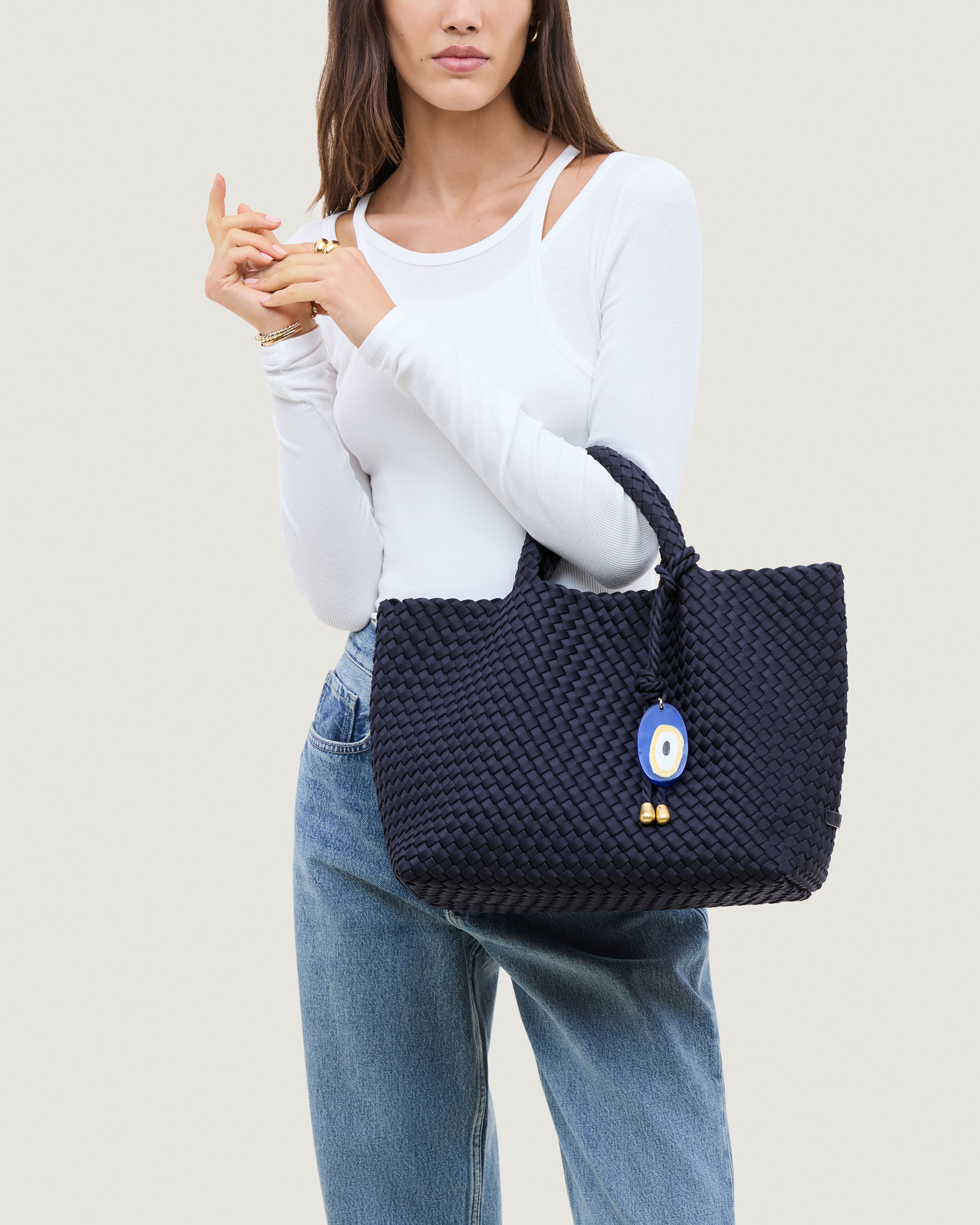 St. Barths Tote in Ink Blue shown on model to illustrate scale and soft silhouette.