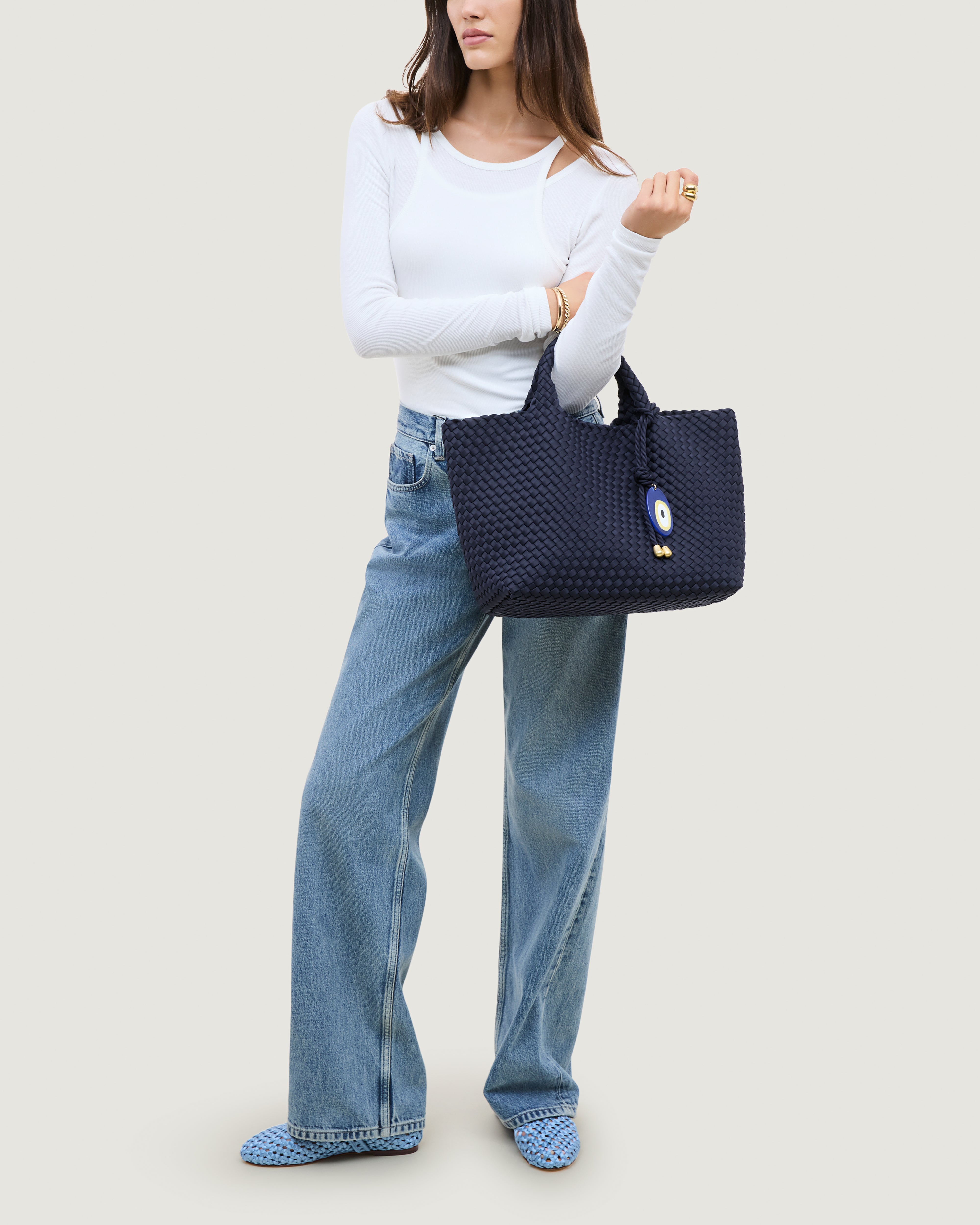 St. Barths Tote in Ink Blue shown on model to illustrate scale and soft silhouette.