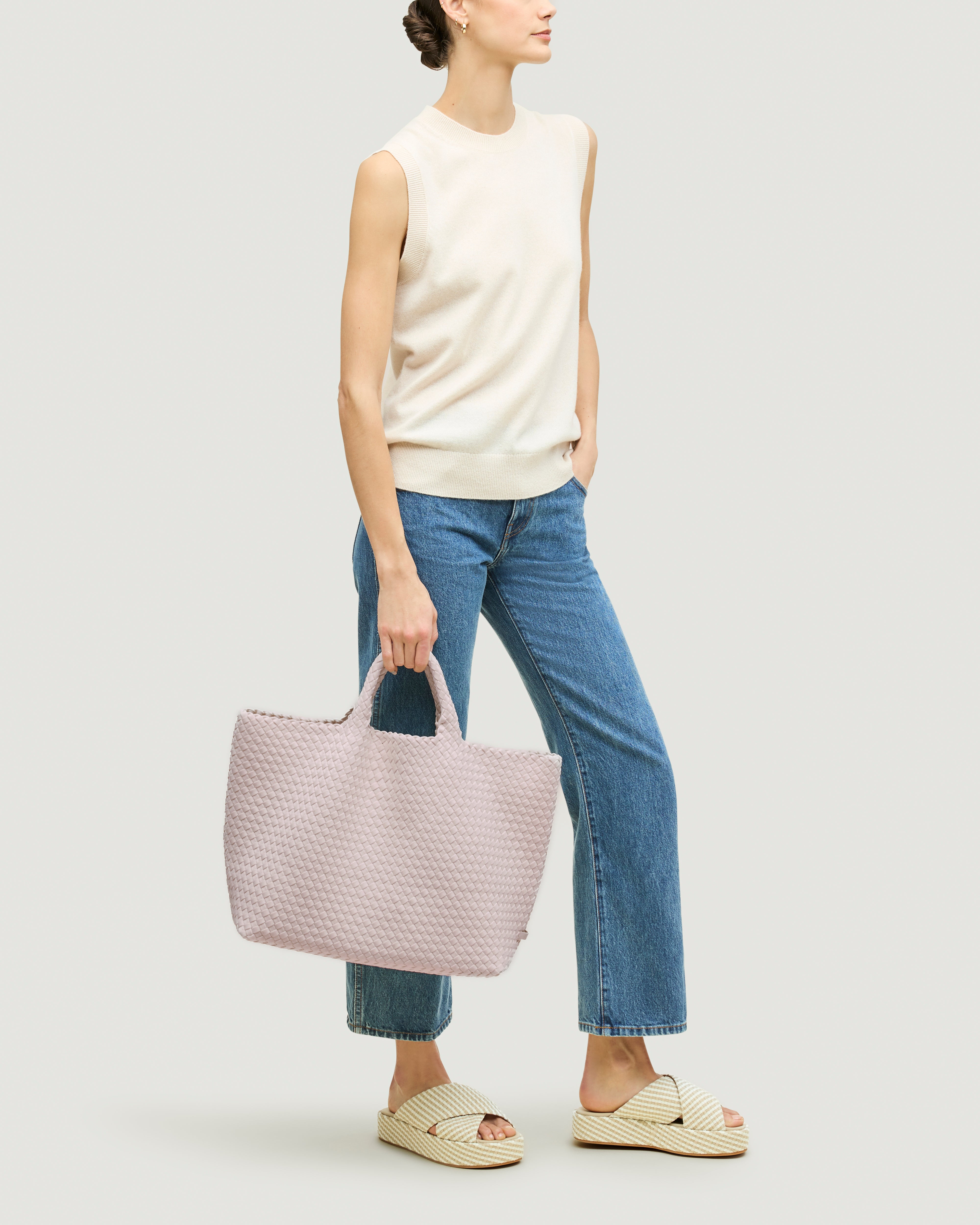 St. Barths Tote in Petal shown on model to illustrate scale and soft silhouette.