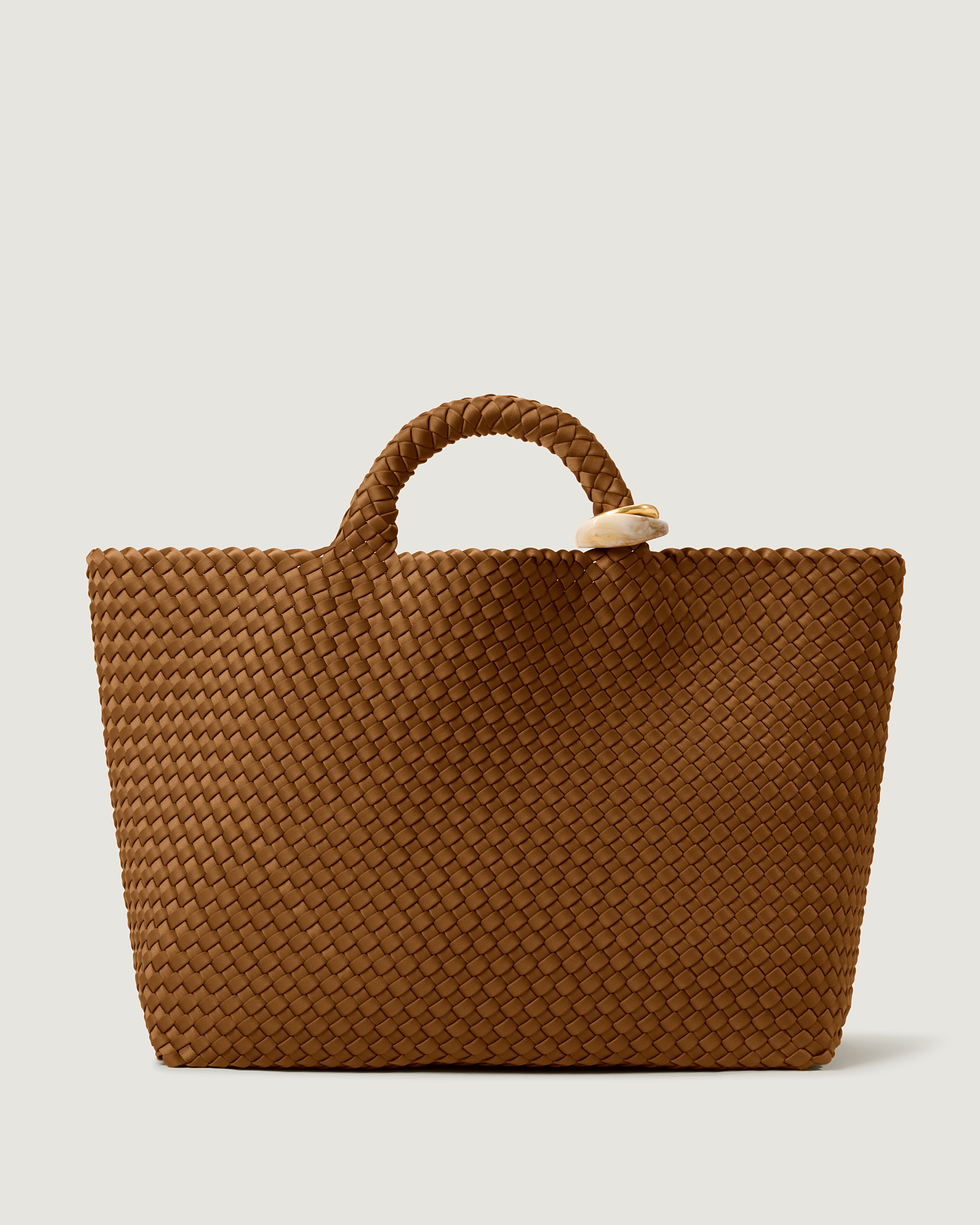 St. Barths Tote in Teak, a saddle brown tone, in handwoven neoprene, featuring an open top and beads on front handle.