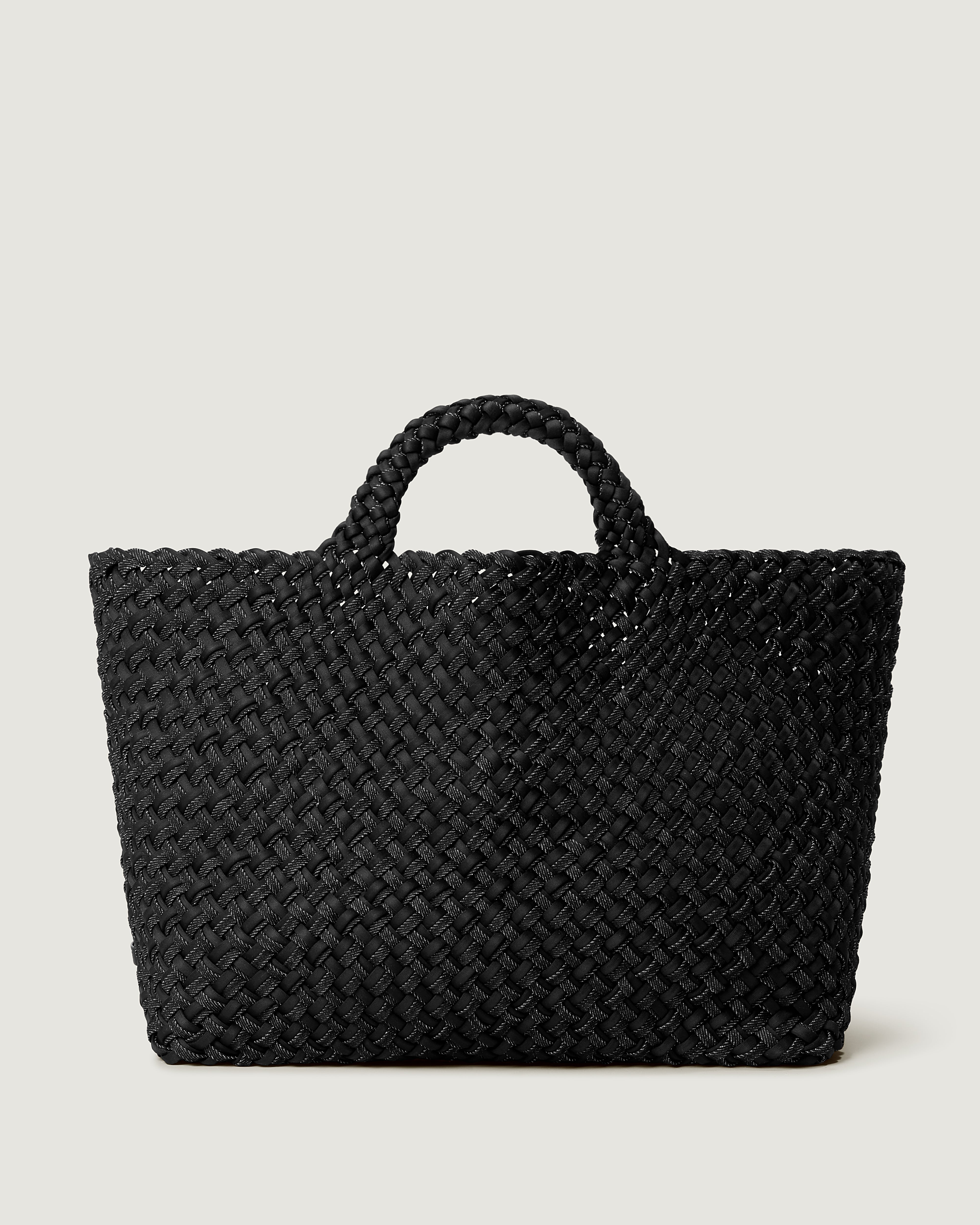 St. Barths Tote in Jet, handwoven in black neoprene with black denim. Featuring an open top, and woven top handles.