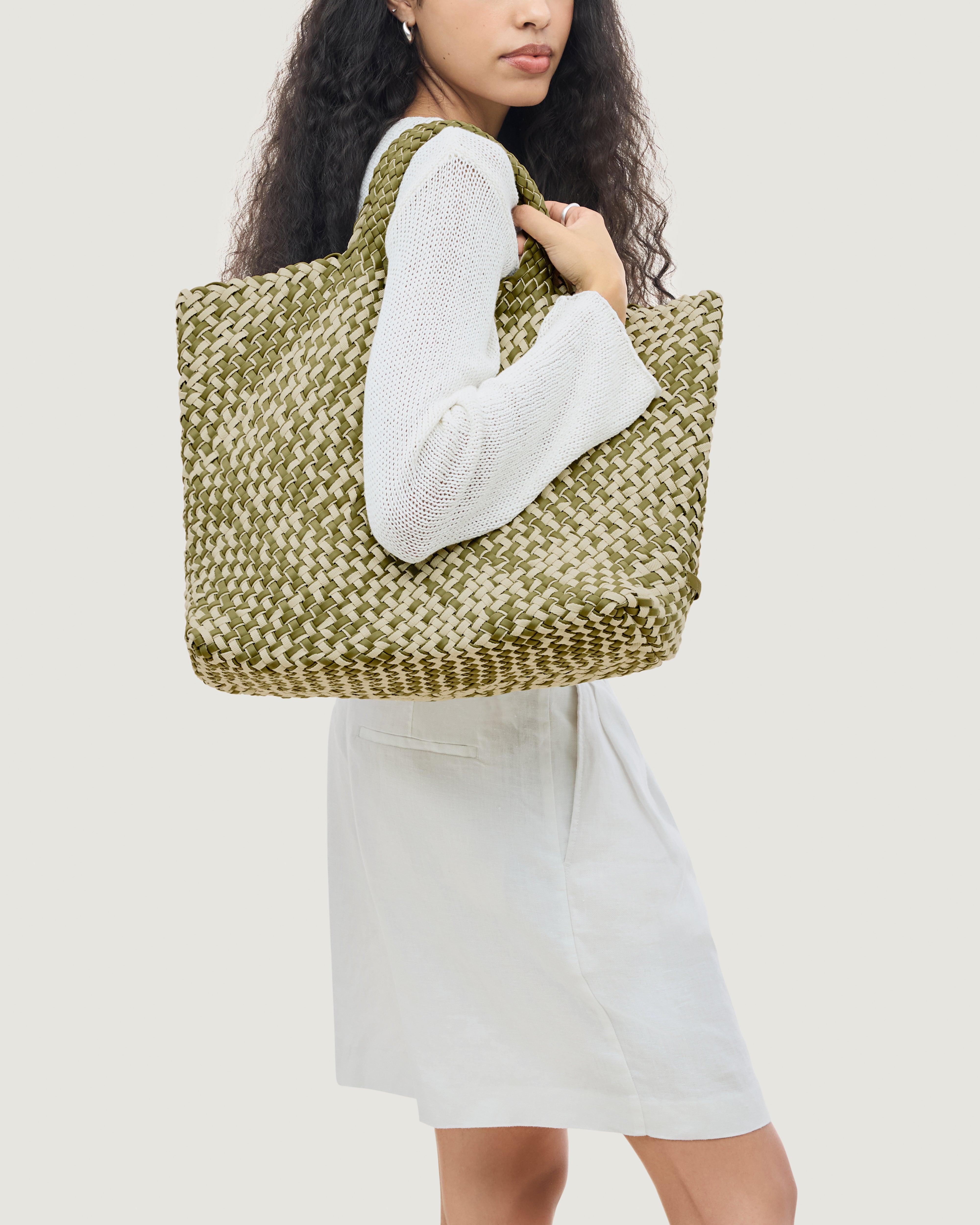 St. Barths Tote in Oletta shown on model to illustrate scale and soft silhouette.