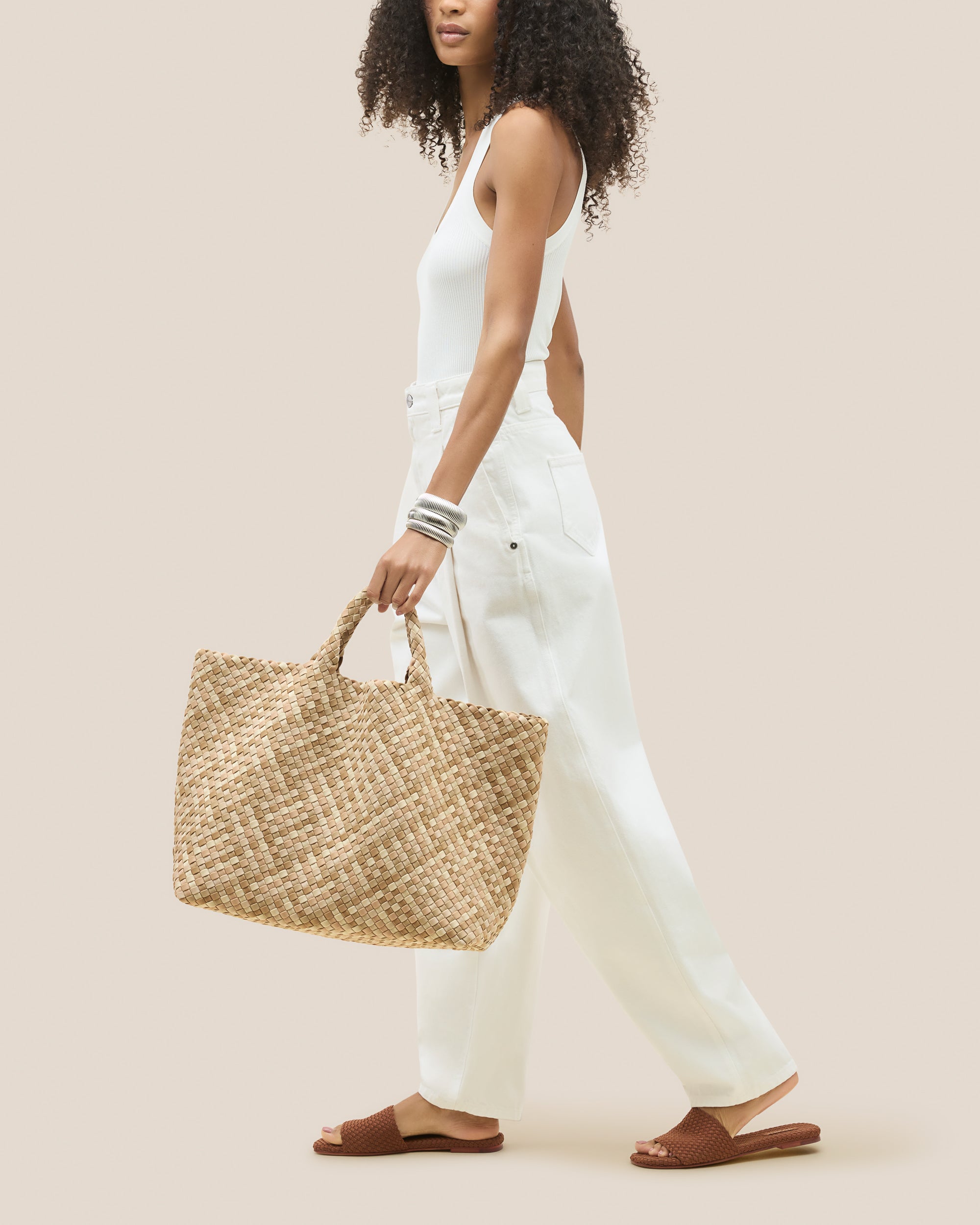 St. Barths Tote in Lanai shown on model to illustrate scale and soft silhouette.