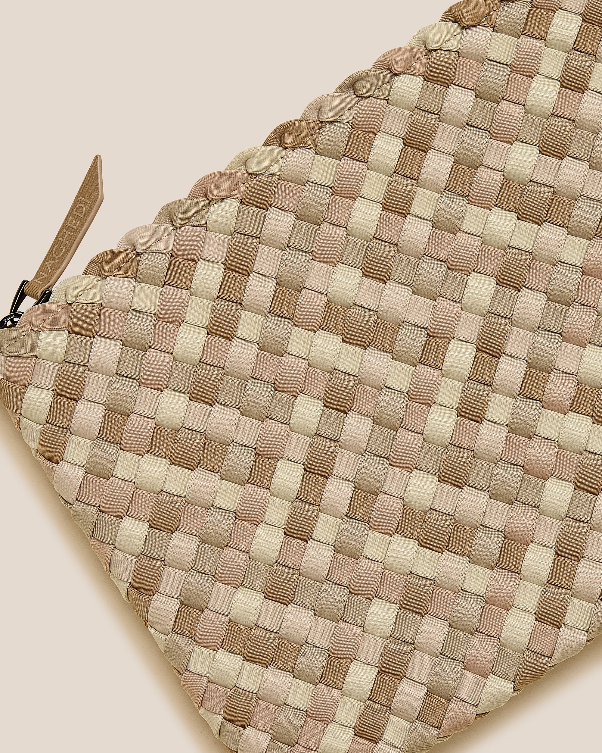 Close-up of included matching woven zippered pouch.