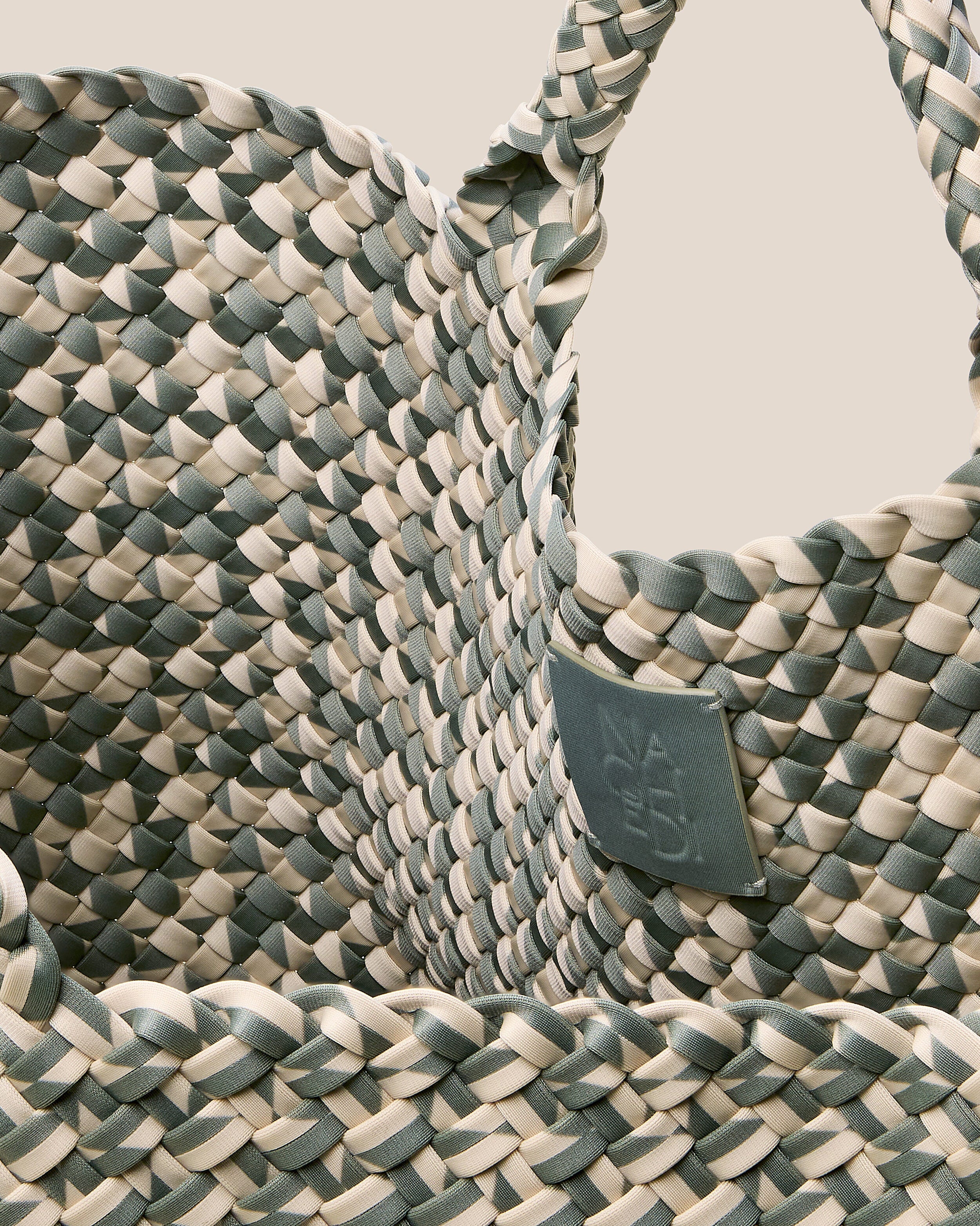 Interior close-up of St. Barths Tote in Papyrus showing its open top, and unlined interior.