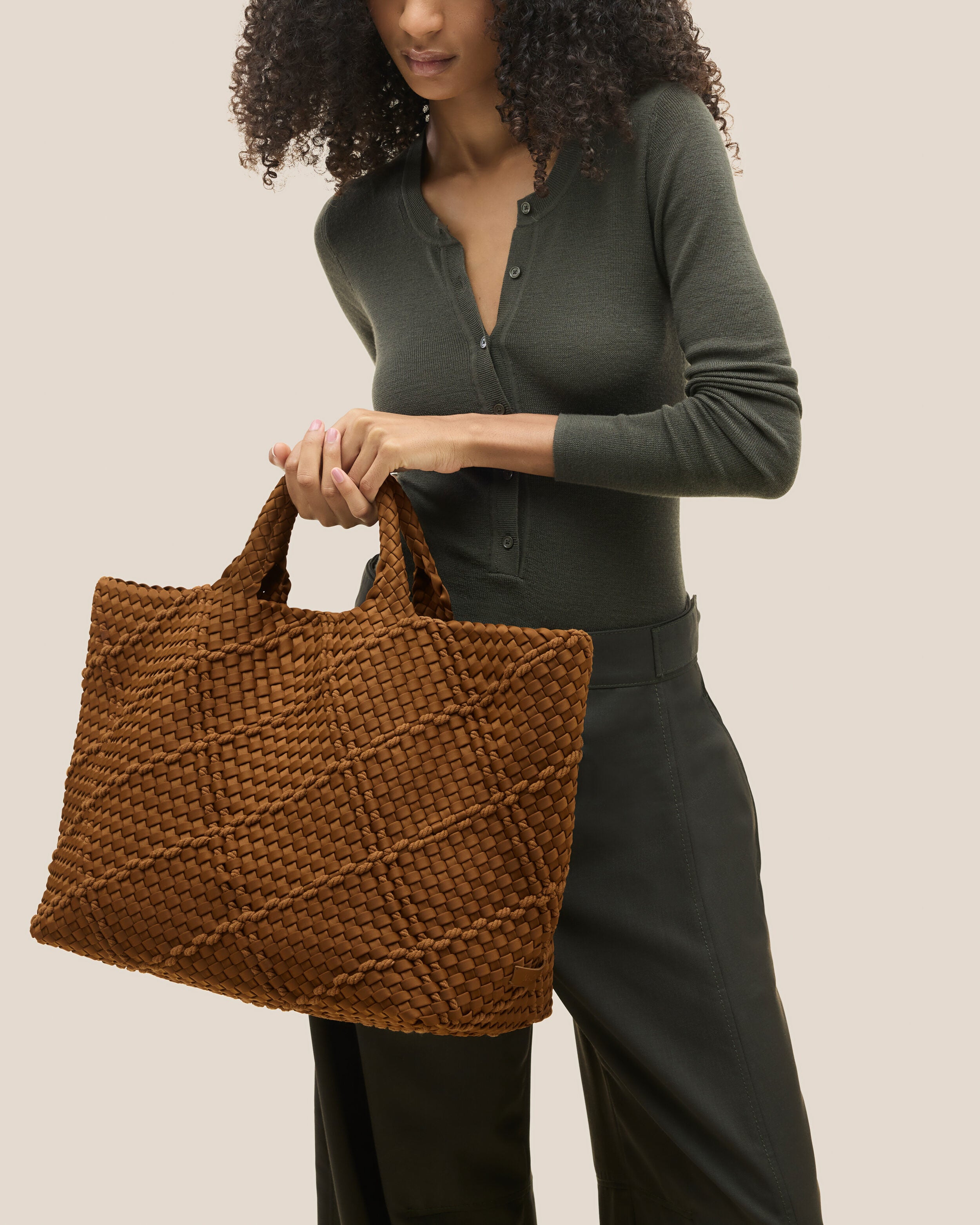 St. Barths Tote in Harbor shown on model to illustrate scale and soft silhouette.