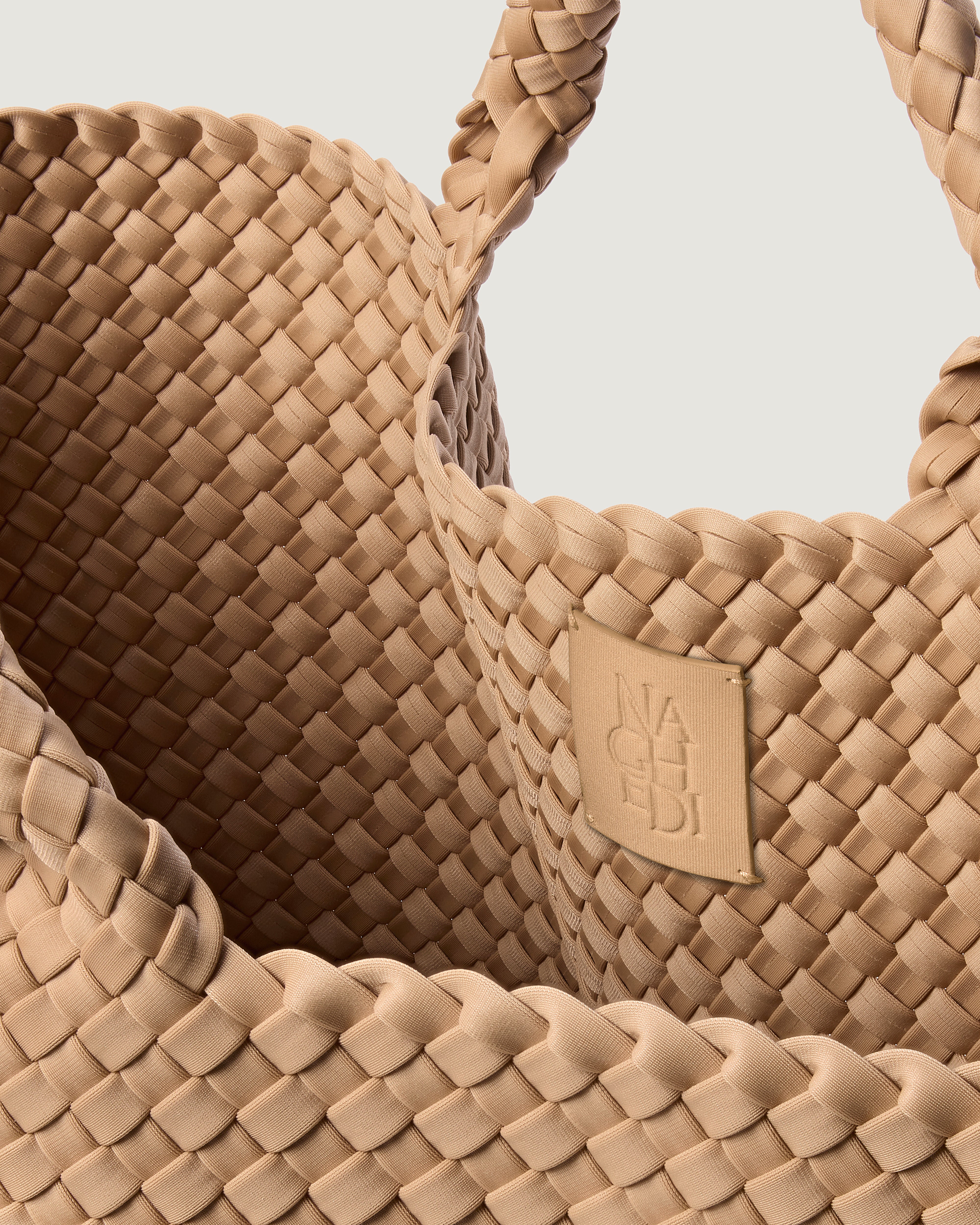 Interior close-up of St. Barths Tote in Camel showing its open top, and unlined interior.