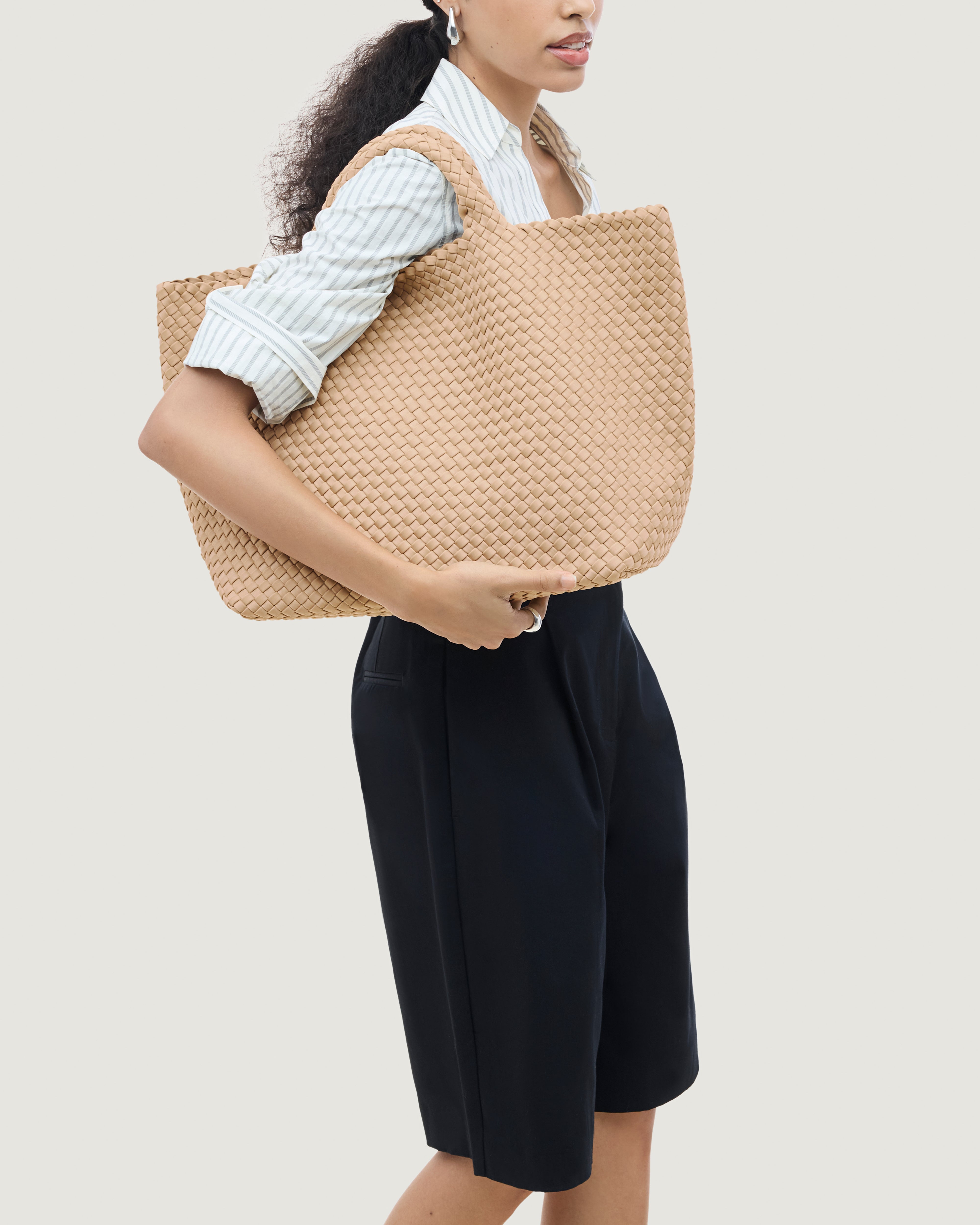 St. Barths Tote in Camel shown on model to illustrate scale and soft silhouette.