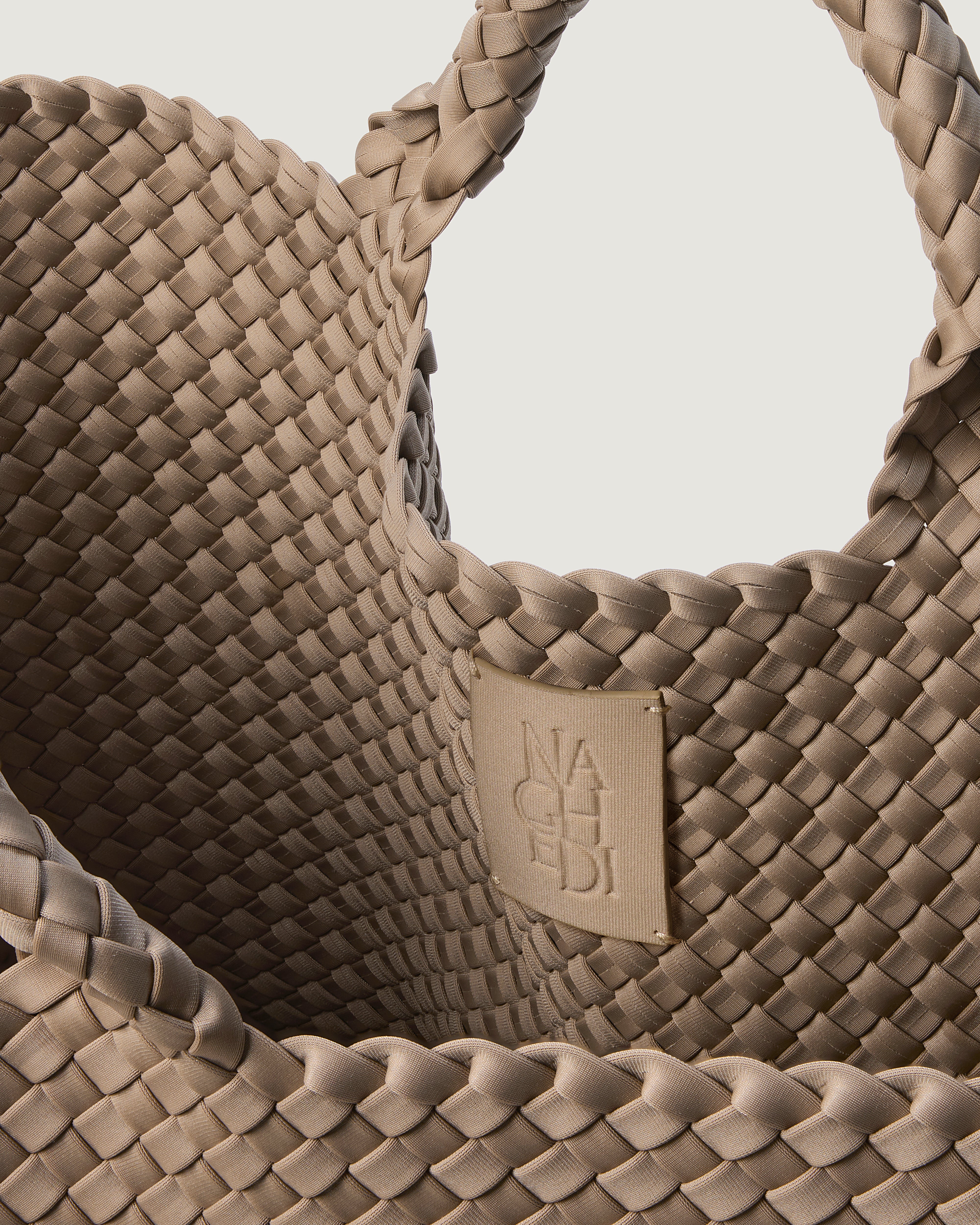 Interior close-up of St. Barths Tote in Cashmere showing its open top, and unlined interior.