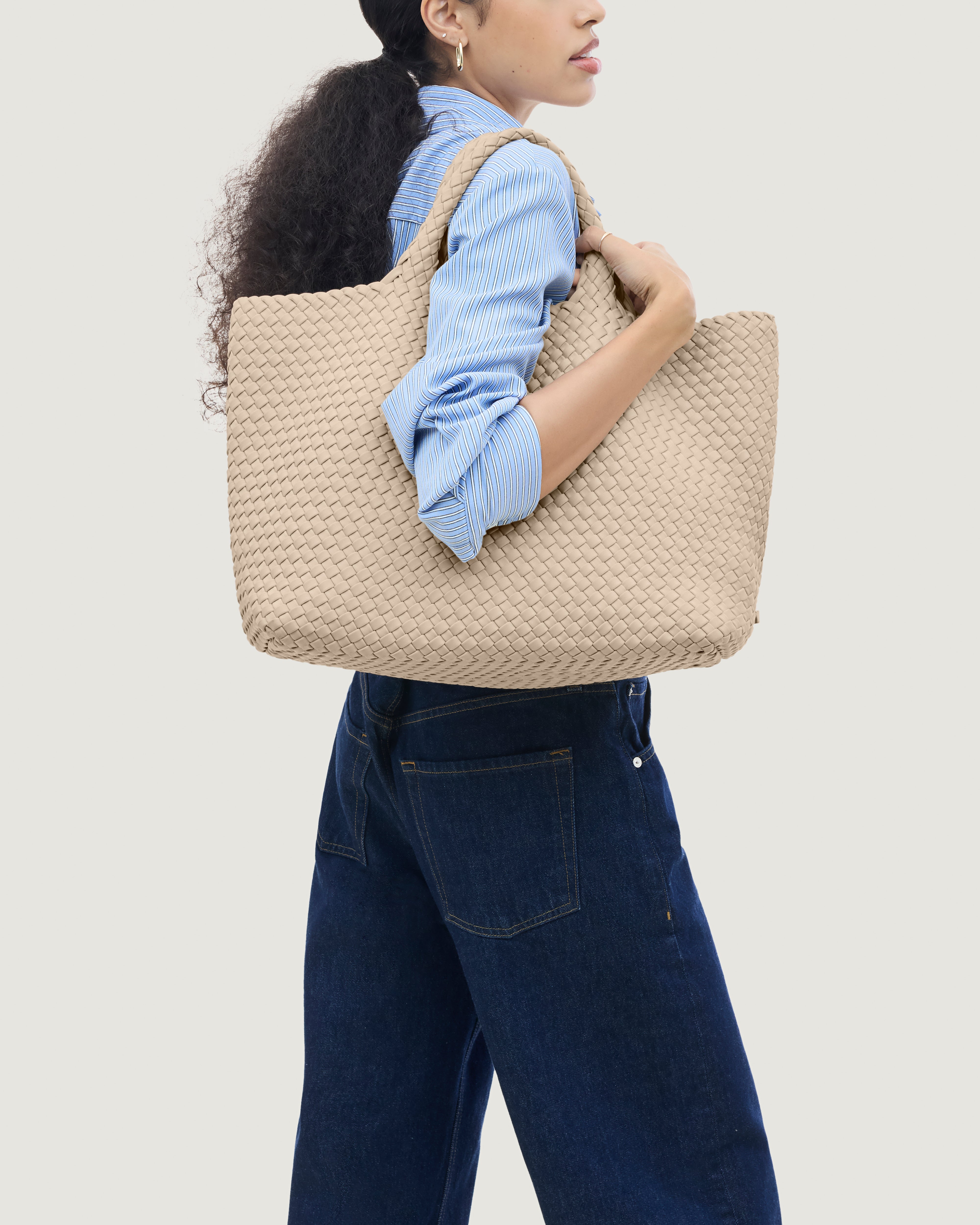 St. Barths Tote in Ecru shown on model to illustrate scale and soft silhouette.