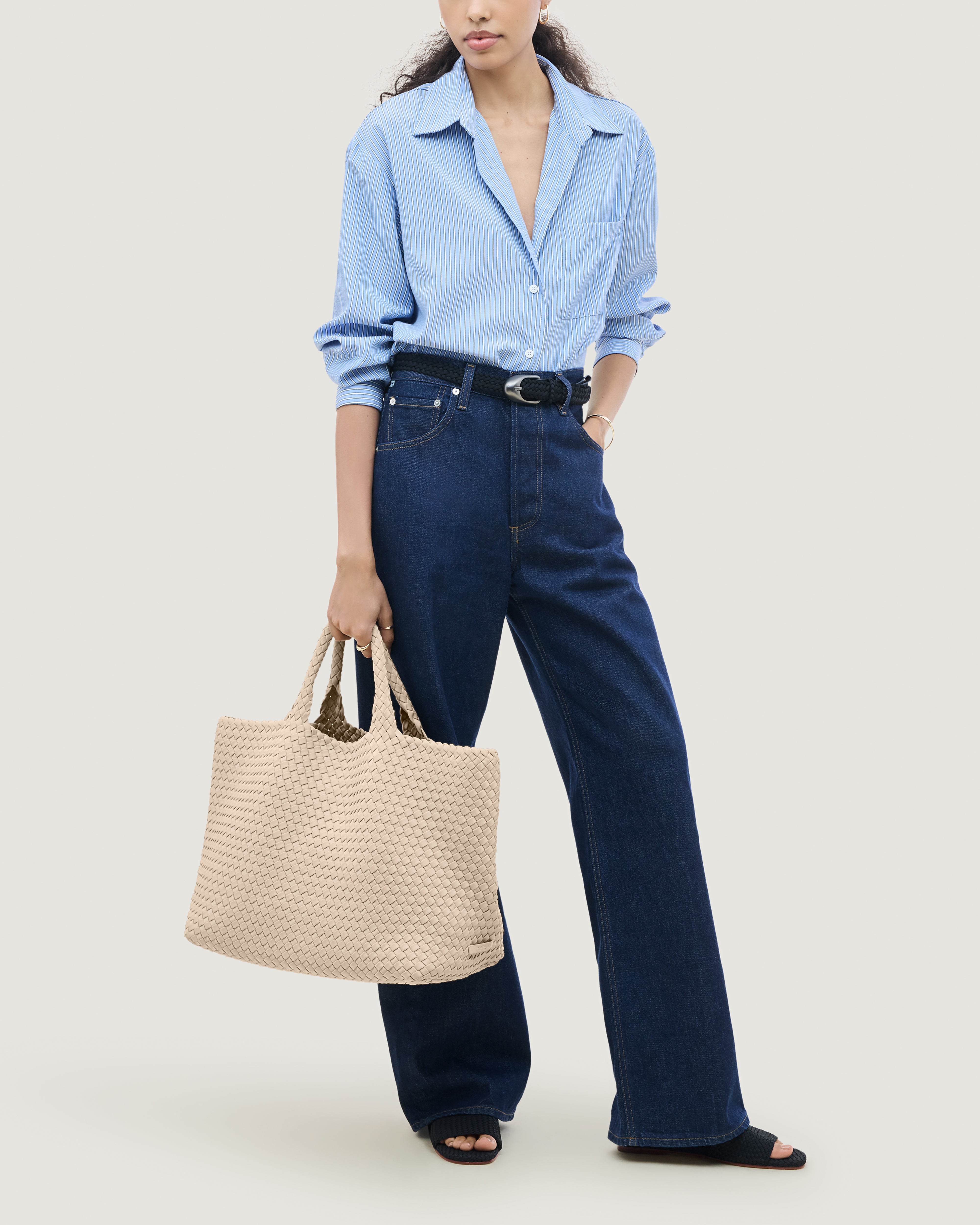 St. Barths Tote in Ecru shown on model to illustrate scale and soft silhouette.