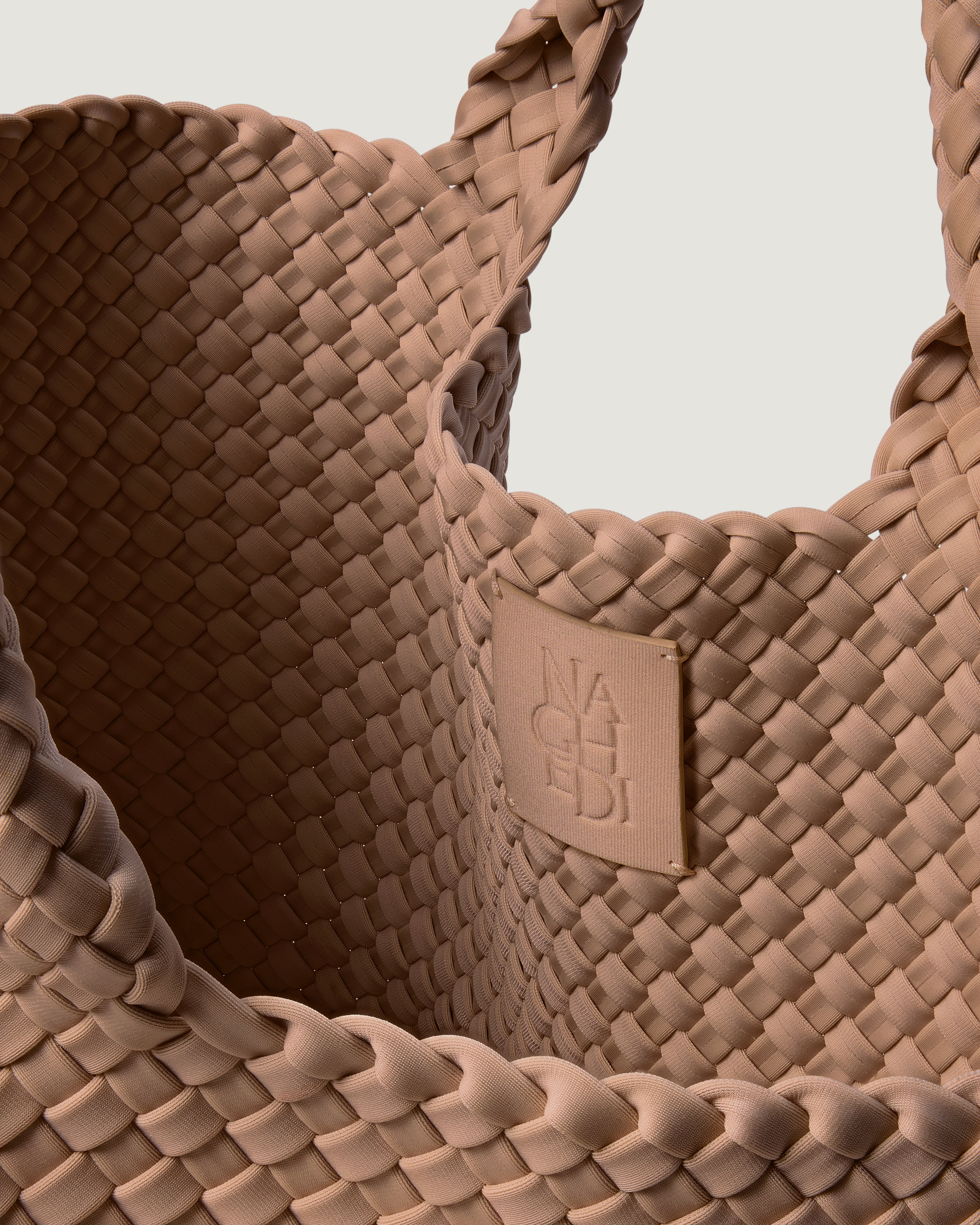 Interior close-up of St. Barths Tote in Seychelles showing its open top, and unlined interior.