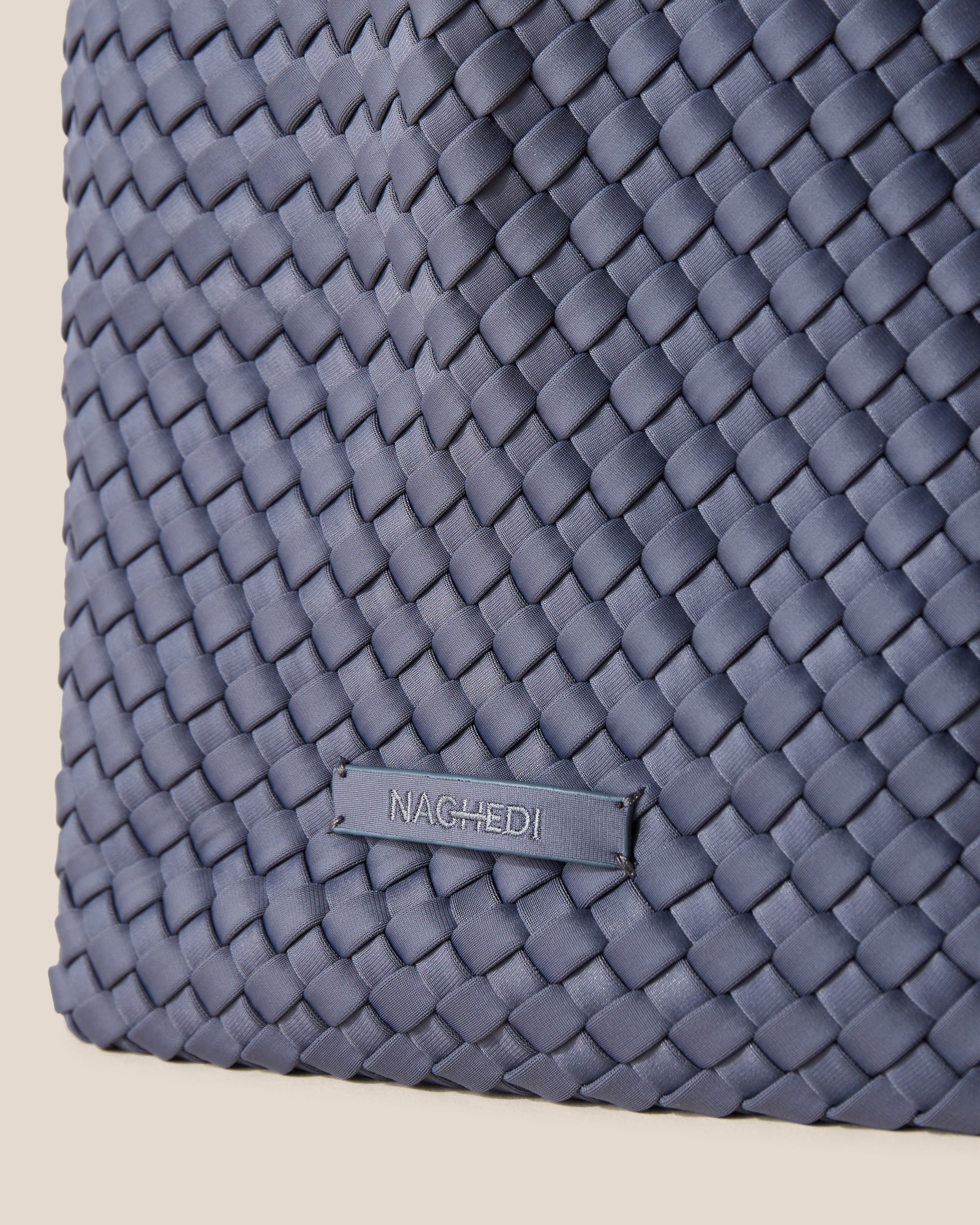 Close-up of stamped NAGHEDI logo on St. Barths Tote in Anchor.