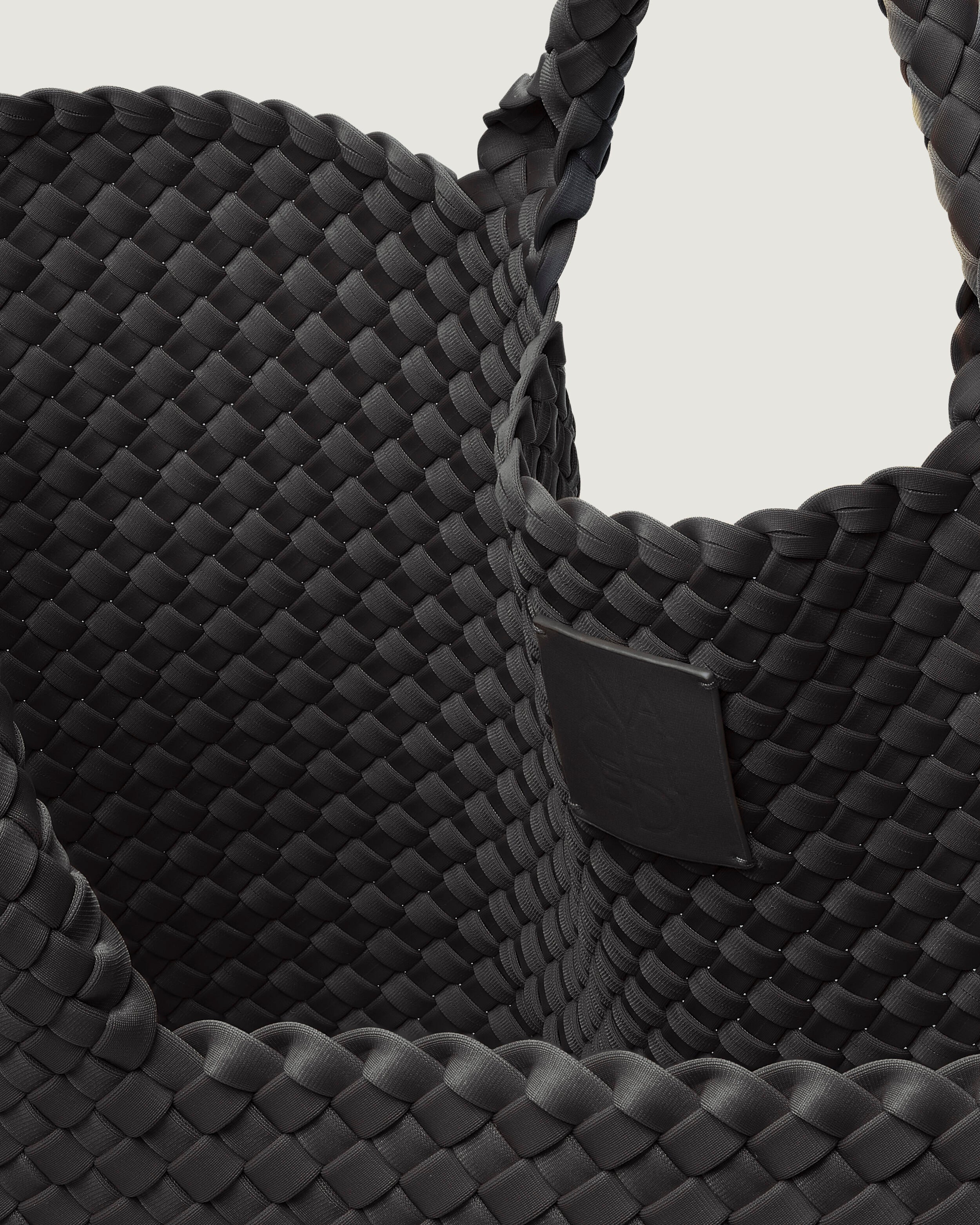 Interior close-up of St. Barths Tote in Ash showing its open top, and unlined interior.