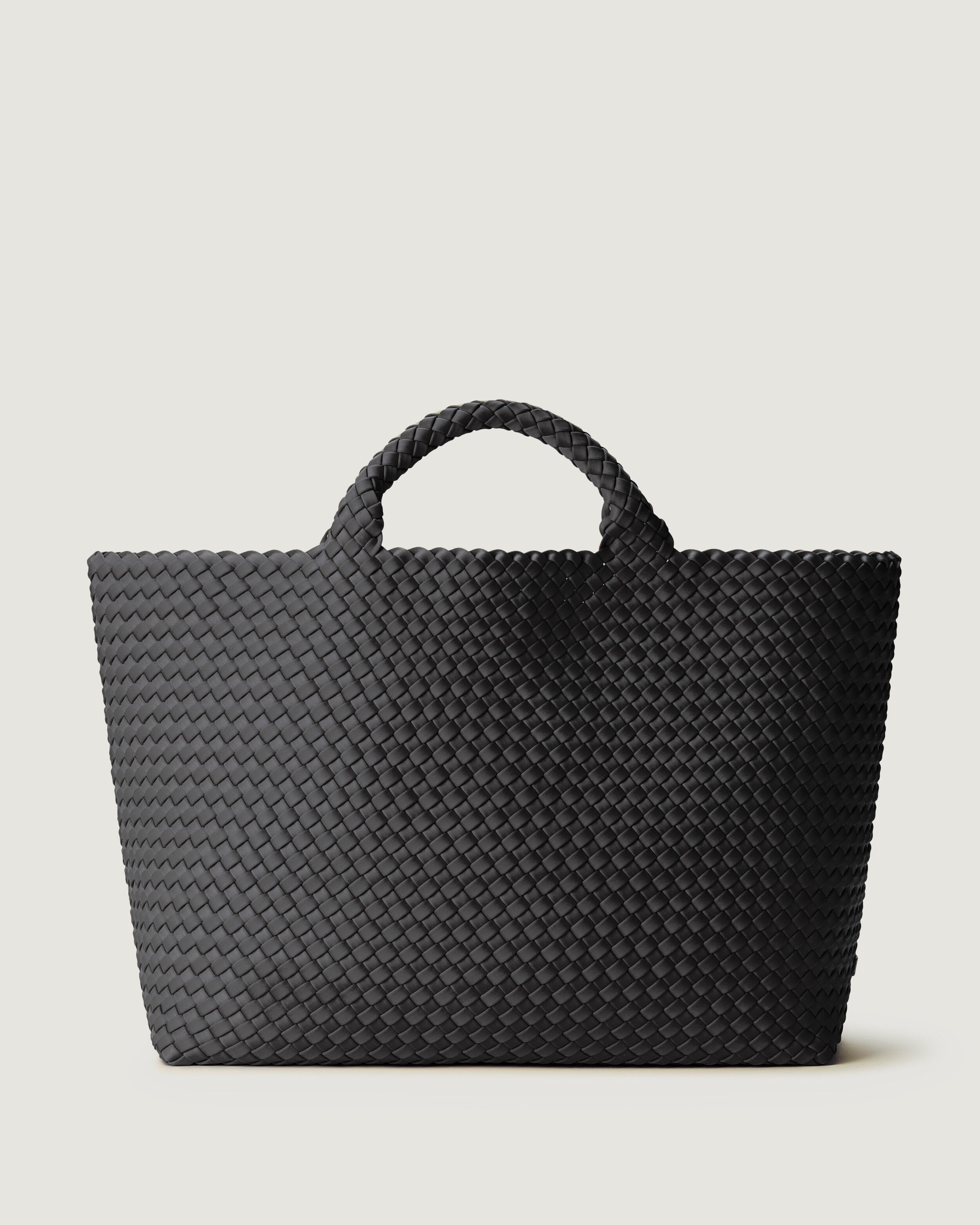 St. Barths Tote in Ash, a slate gray  tone, in handwoven neoprene, featuring an open top, and woven top handles.