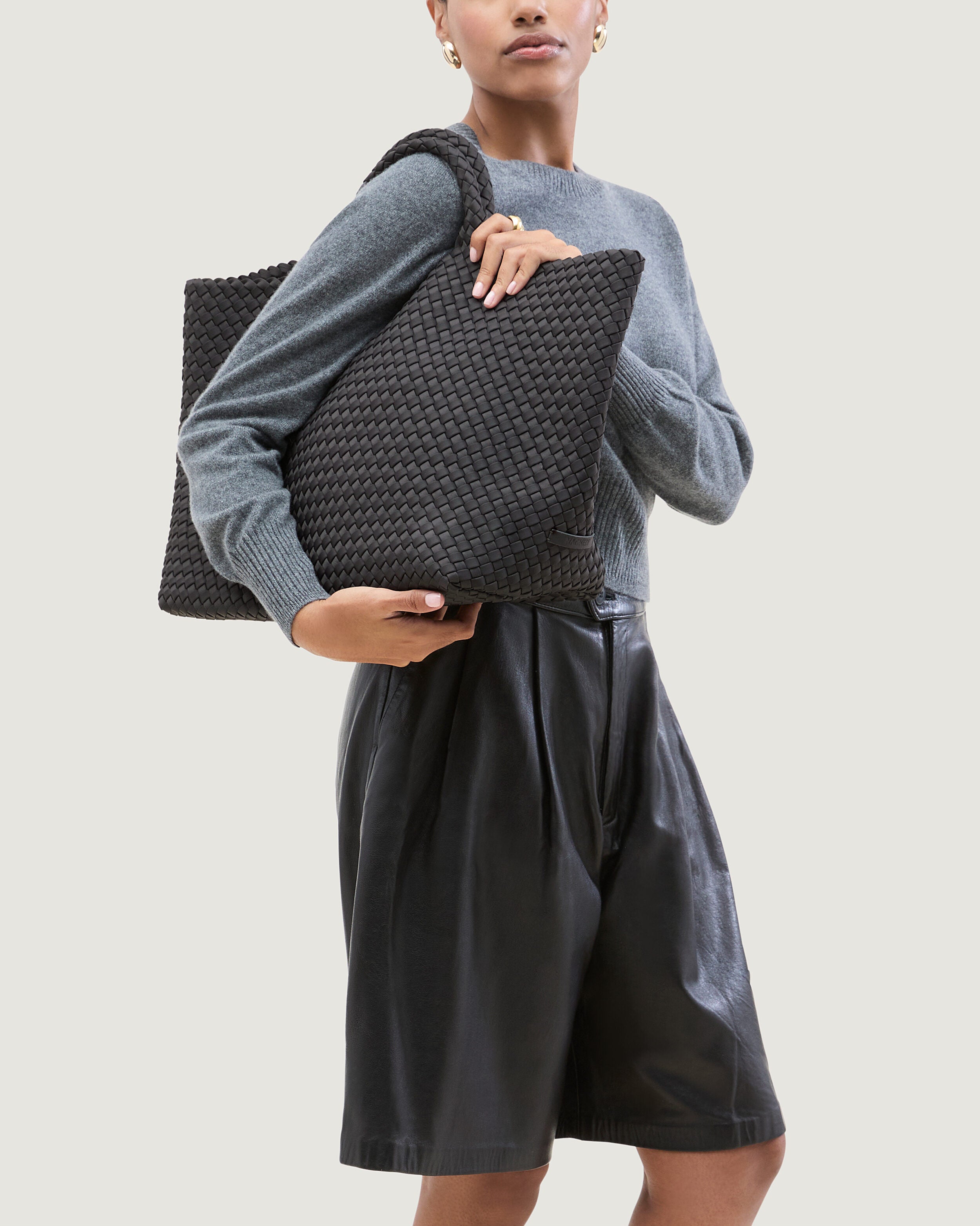 St. Barths Tote in Ash shown on model to illustrate scale and soft silhouette.