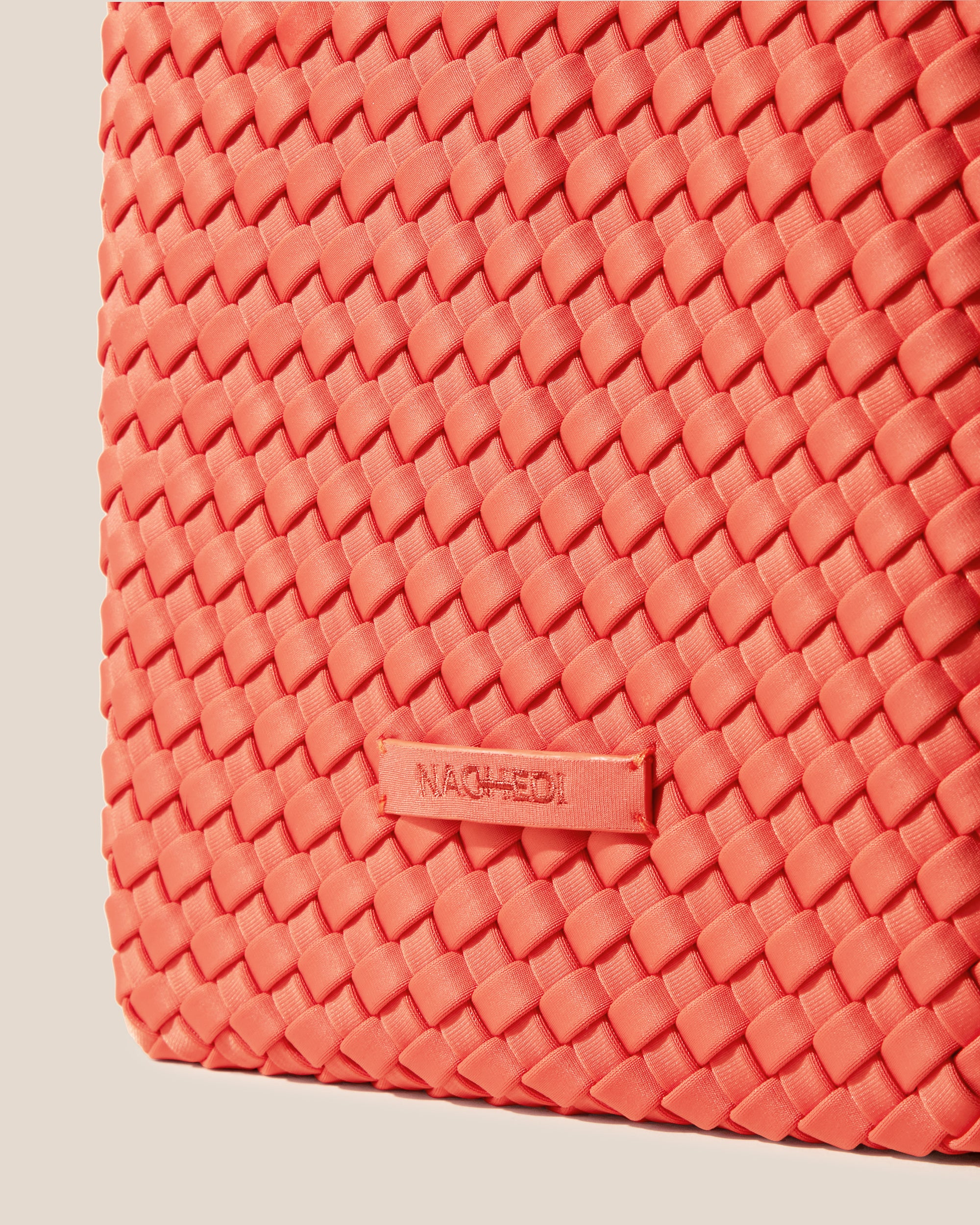 Close-up of stamped NAGHEDI logo on St. Barths Tote in Bonaire.