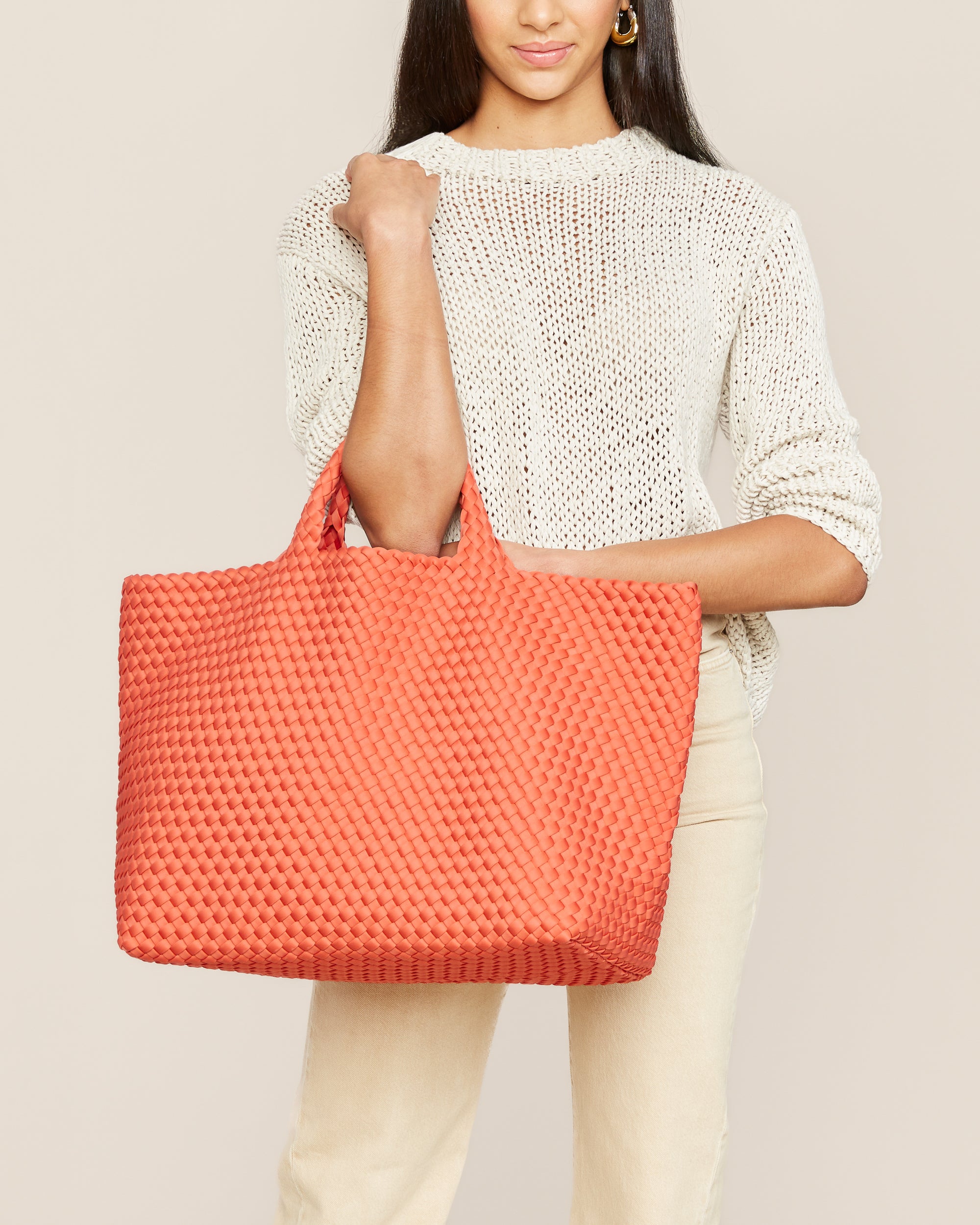 St. Barths Tote in Bonaire shown on model to illustrate scale and soft silhouette.