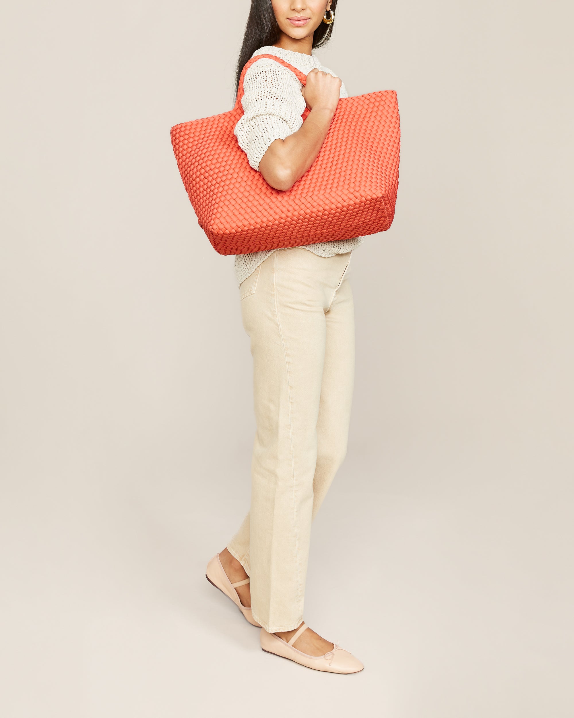 St. Barths Tote in Bonaire shown on model to illustrate scale and soft silhouette.