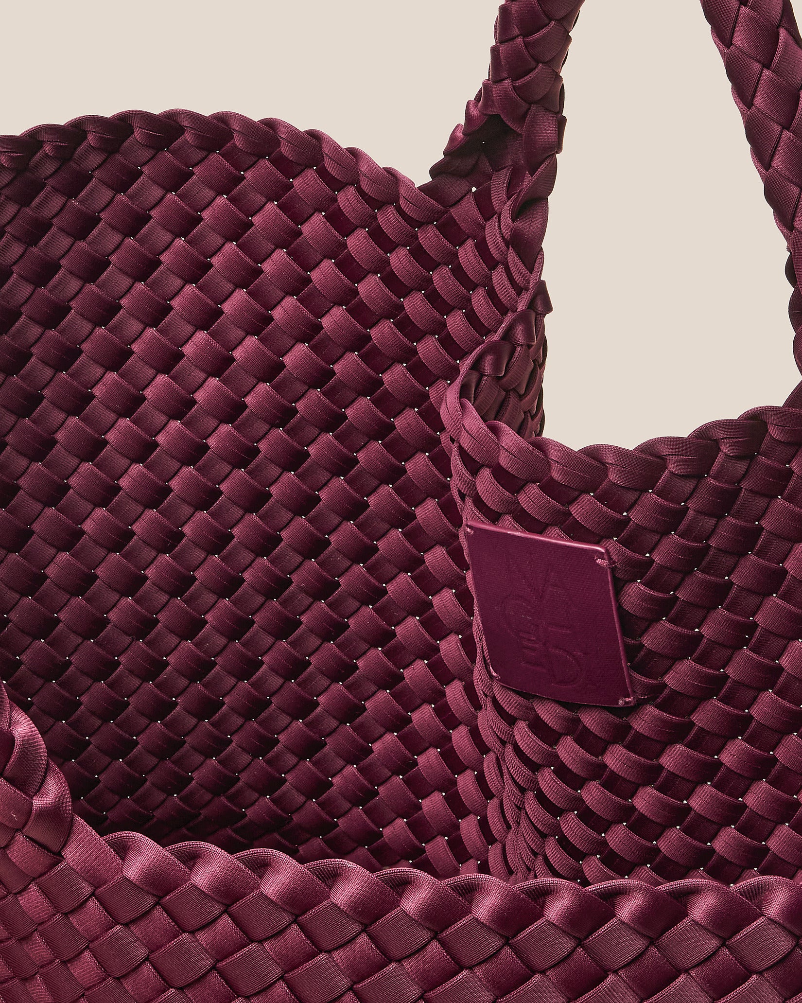 Interior close-up of St. Barths Large Tote Bag in Bordeaux showing its open top, and unlined interior.