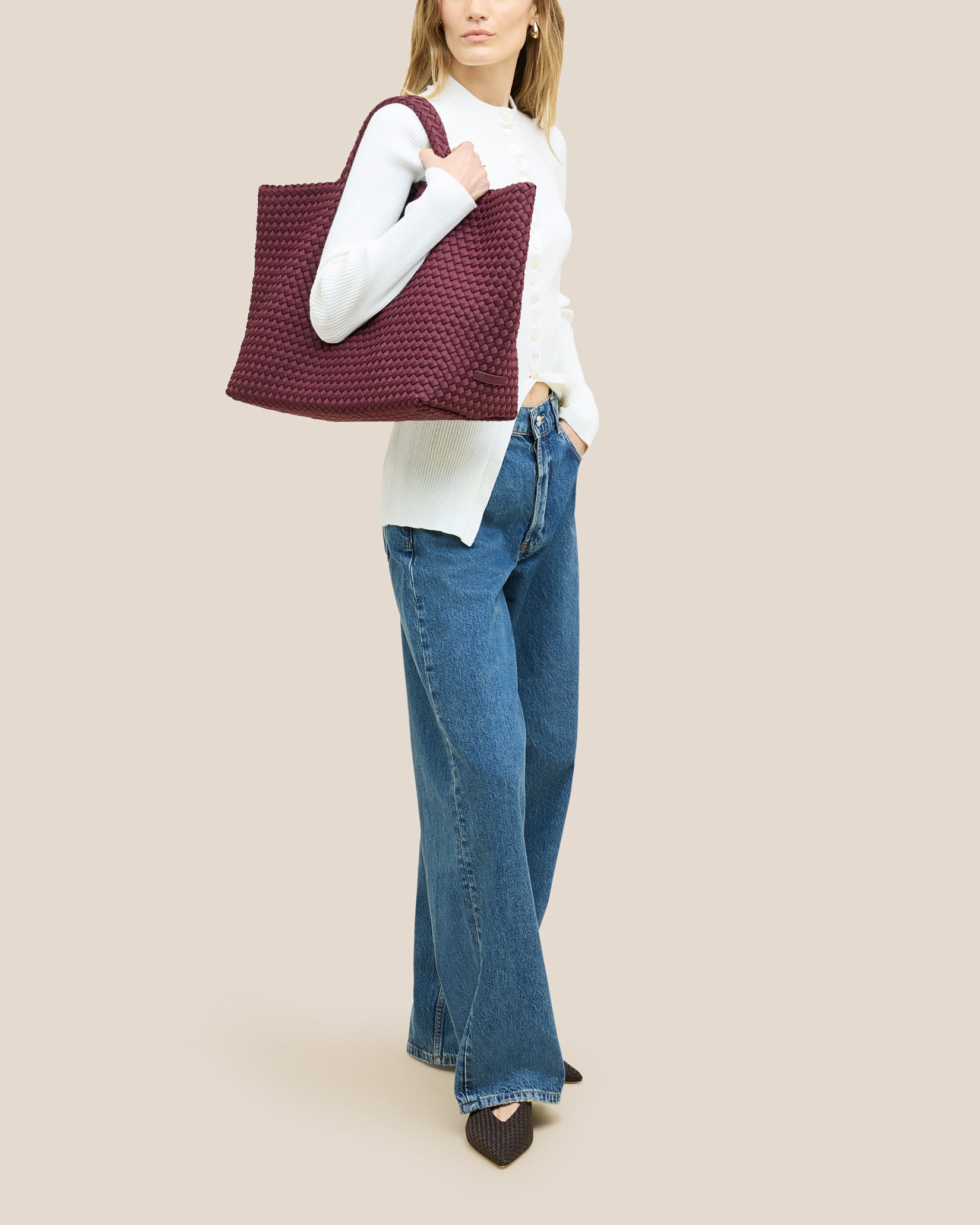 St. Barths Large Tote Bag in Bordeaux shown on model to illustrate scale and soft silhouette.