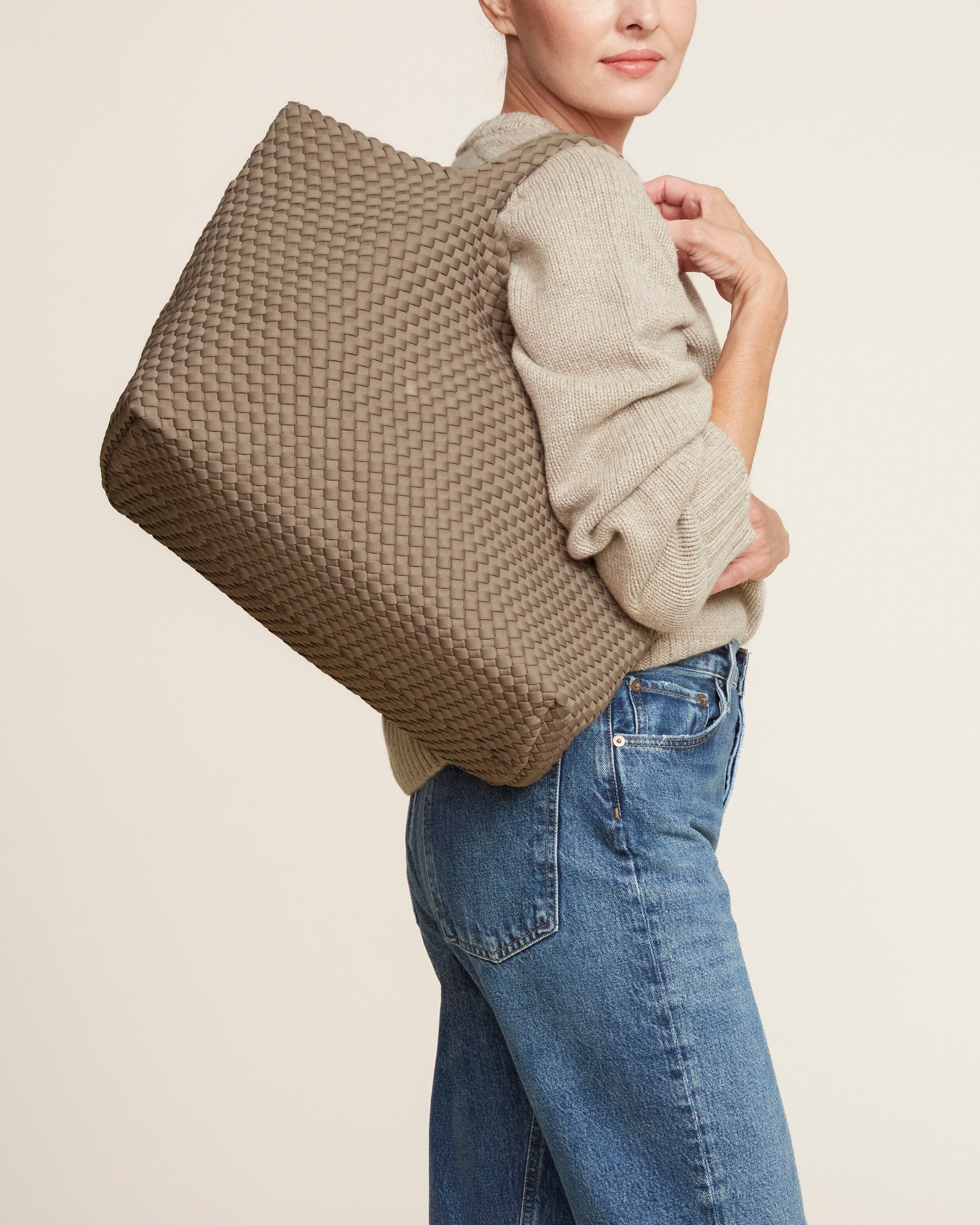 St. Barths Tote in Cashmere shown on model to illustrate scale and soft silhouette.
