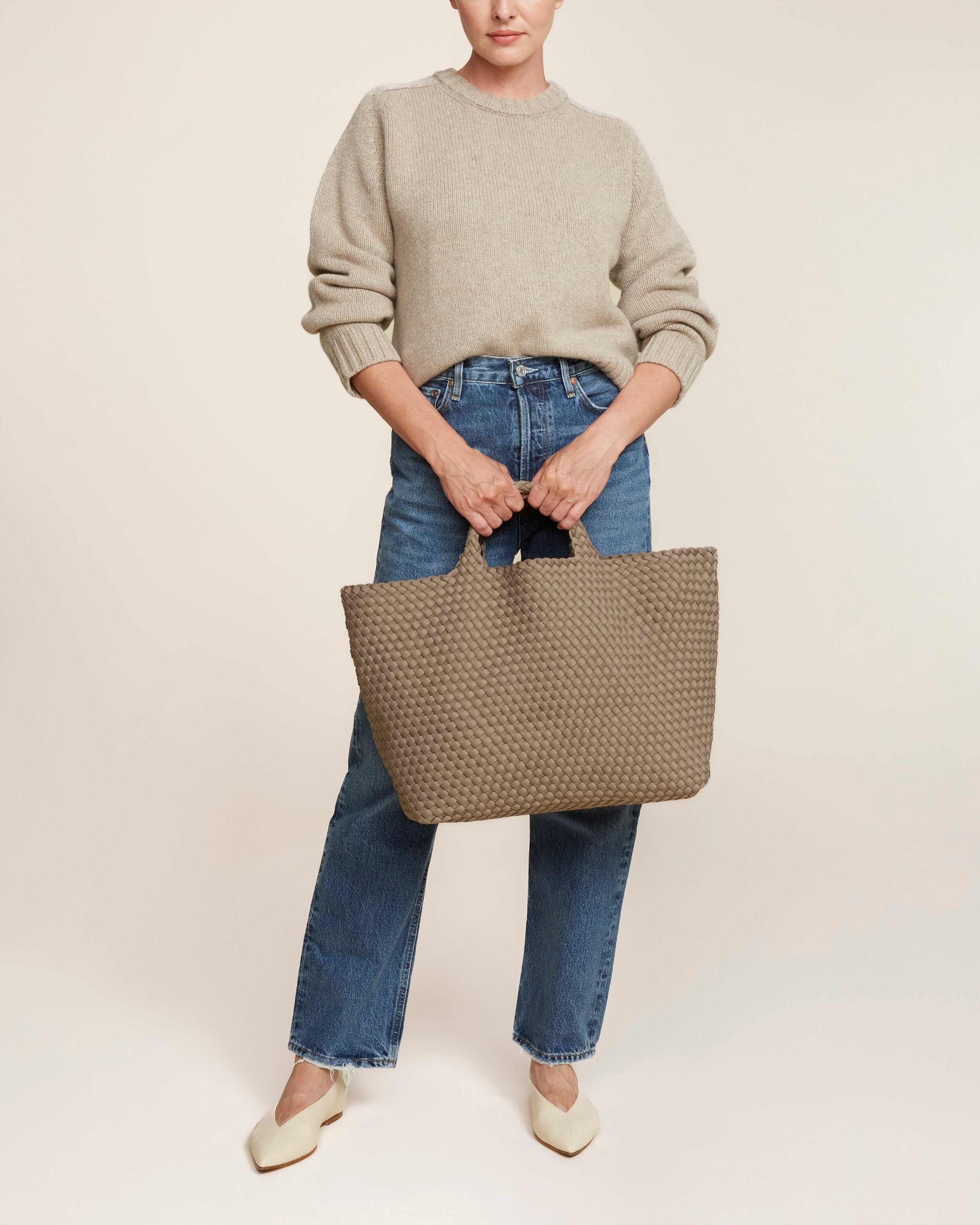 St. Barths Tote in Cashmere shown on model to illustrate scale and soft silhouette.