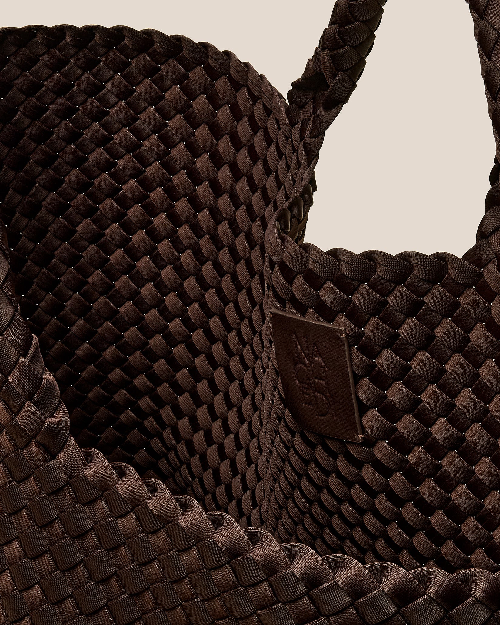 Interior close-up of St. Barths Large Tote Bag in Chocolate showing its open top, and unlined interior.