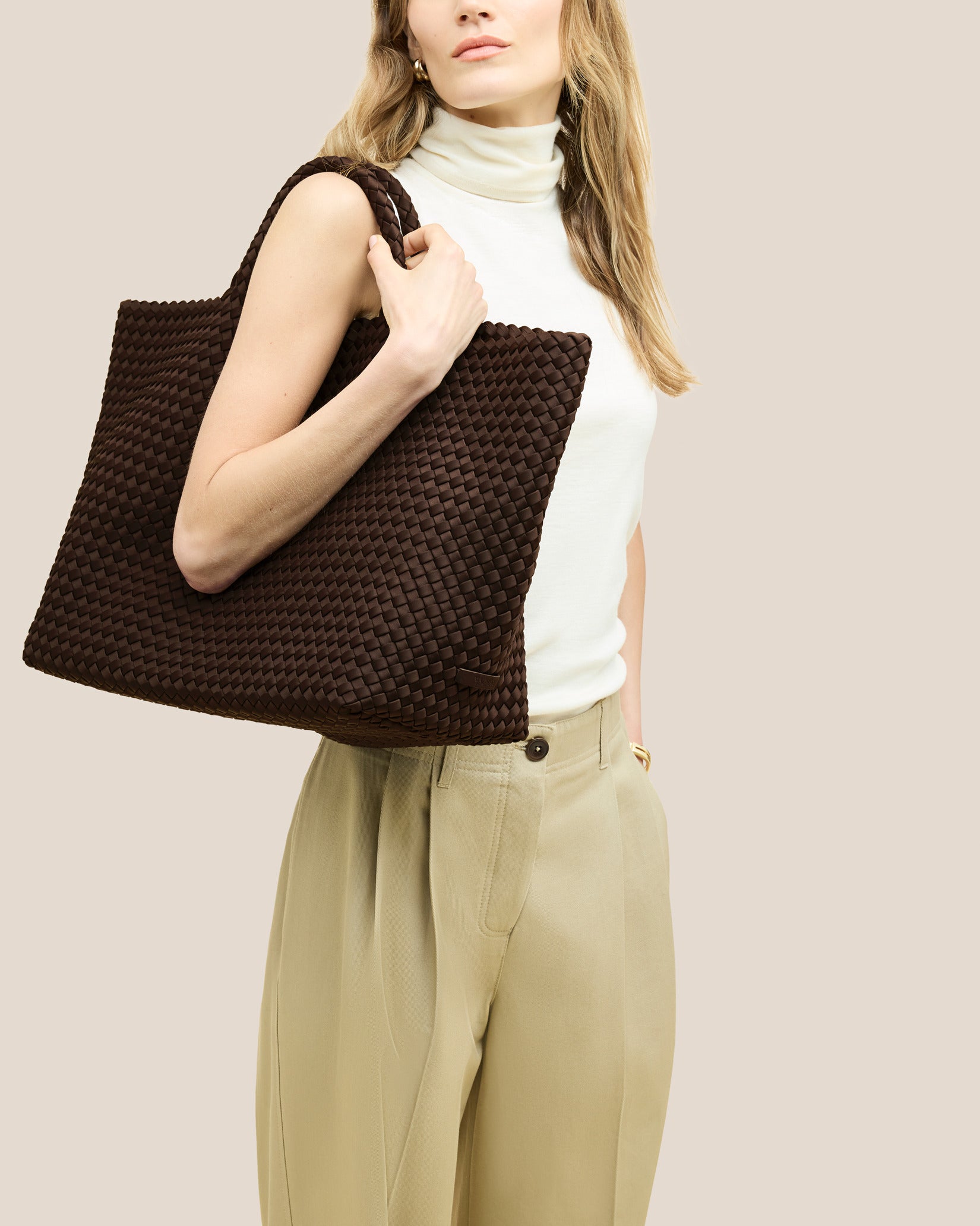 St. Barths Large Tote Bag in Chocolate shown on model to illustrate scale and soft silhouette.