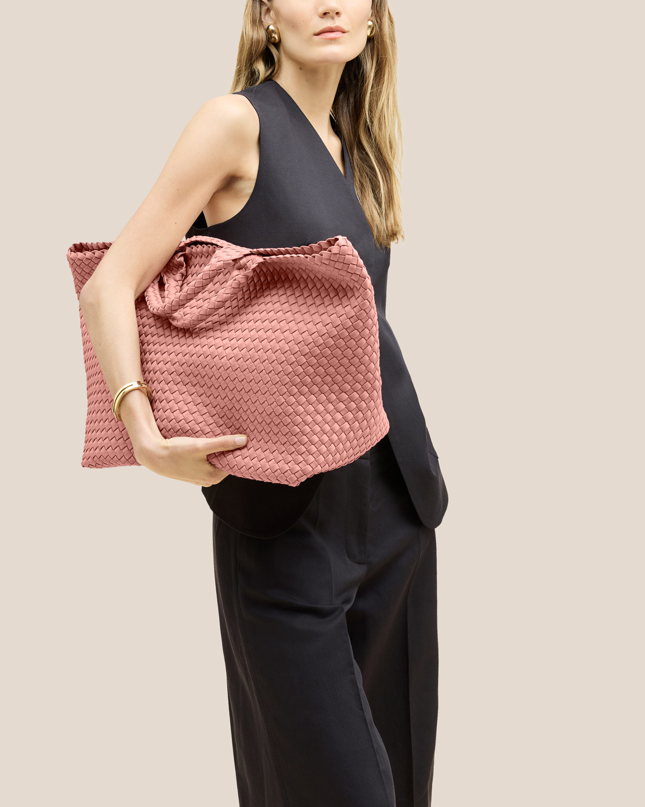 St. Barths Tote in Dusk shown on model to illustrate scale and soft silhouette.
