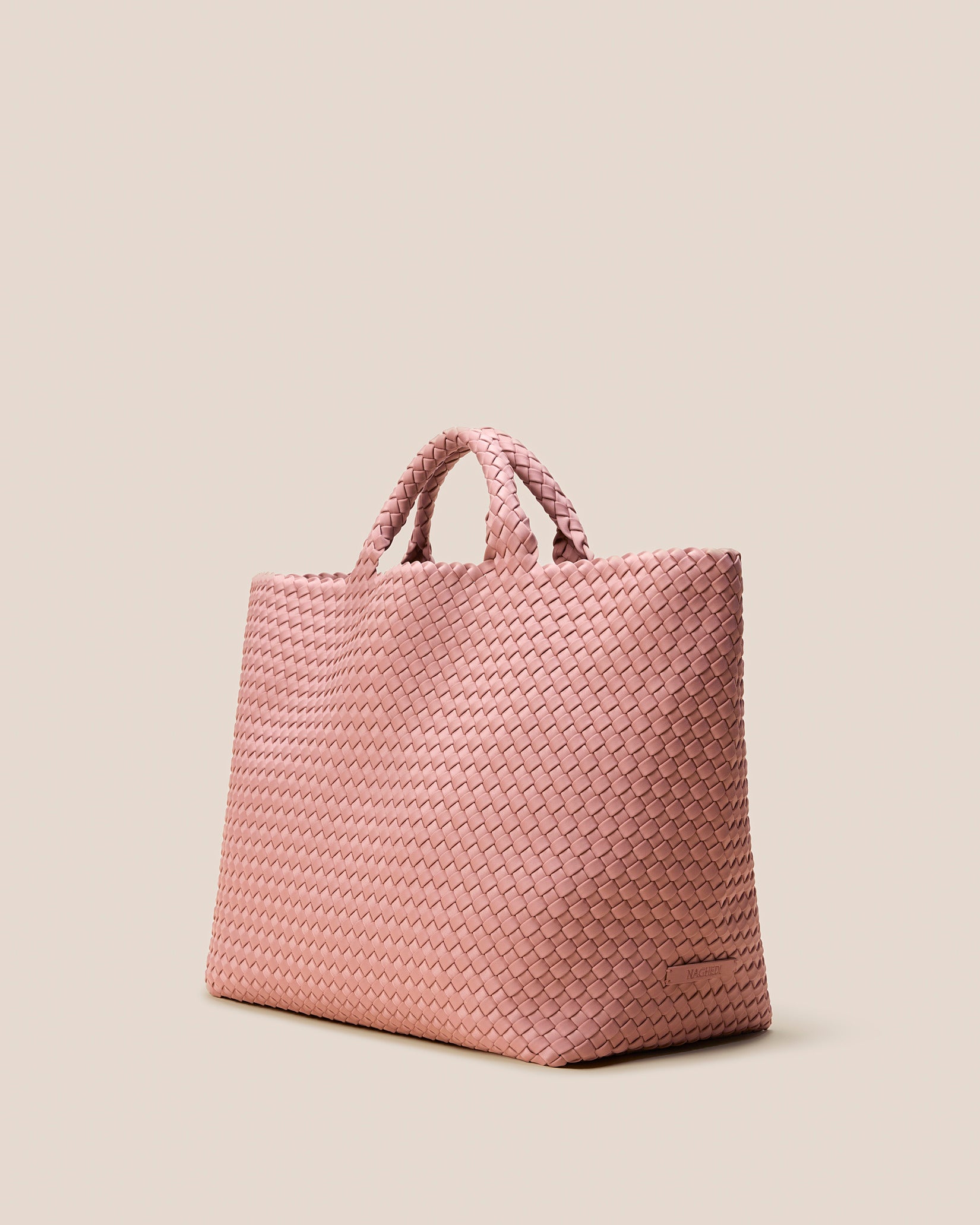 St. Barths Large Tote Bag in Dusk shown from a side angle, highlighting its handwoven neoprene and open top.