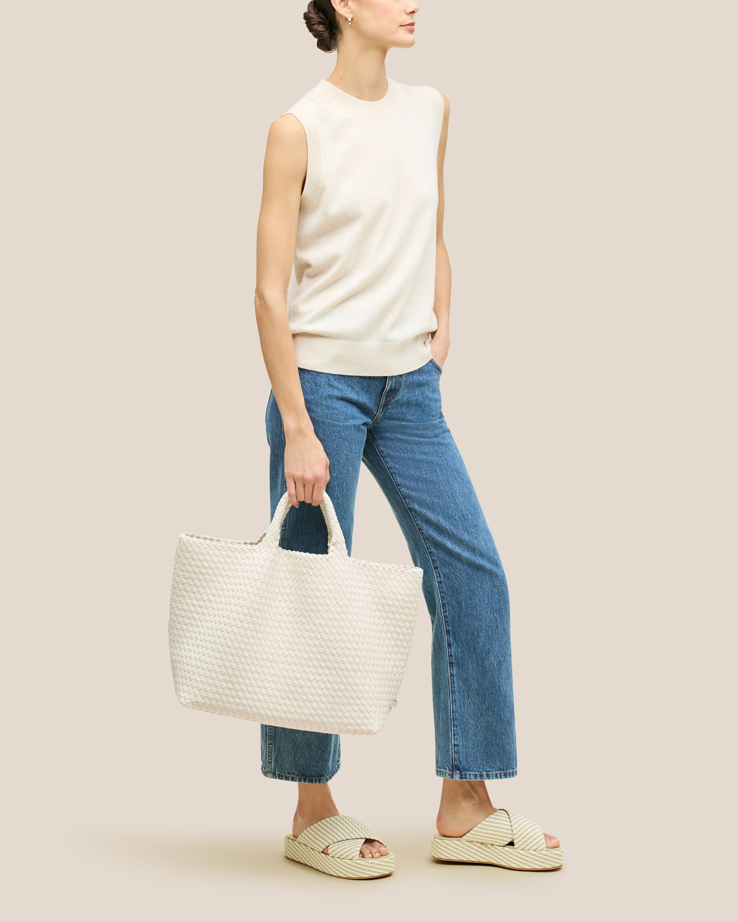 St. Barths Tote in Jasmine shown on model to illustrate scale and soft silhouette.