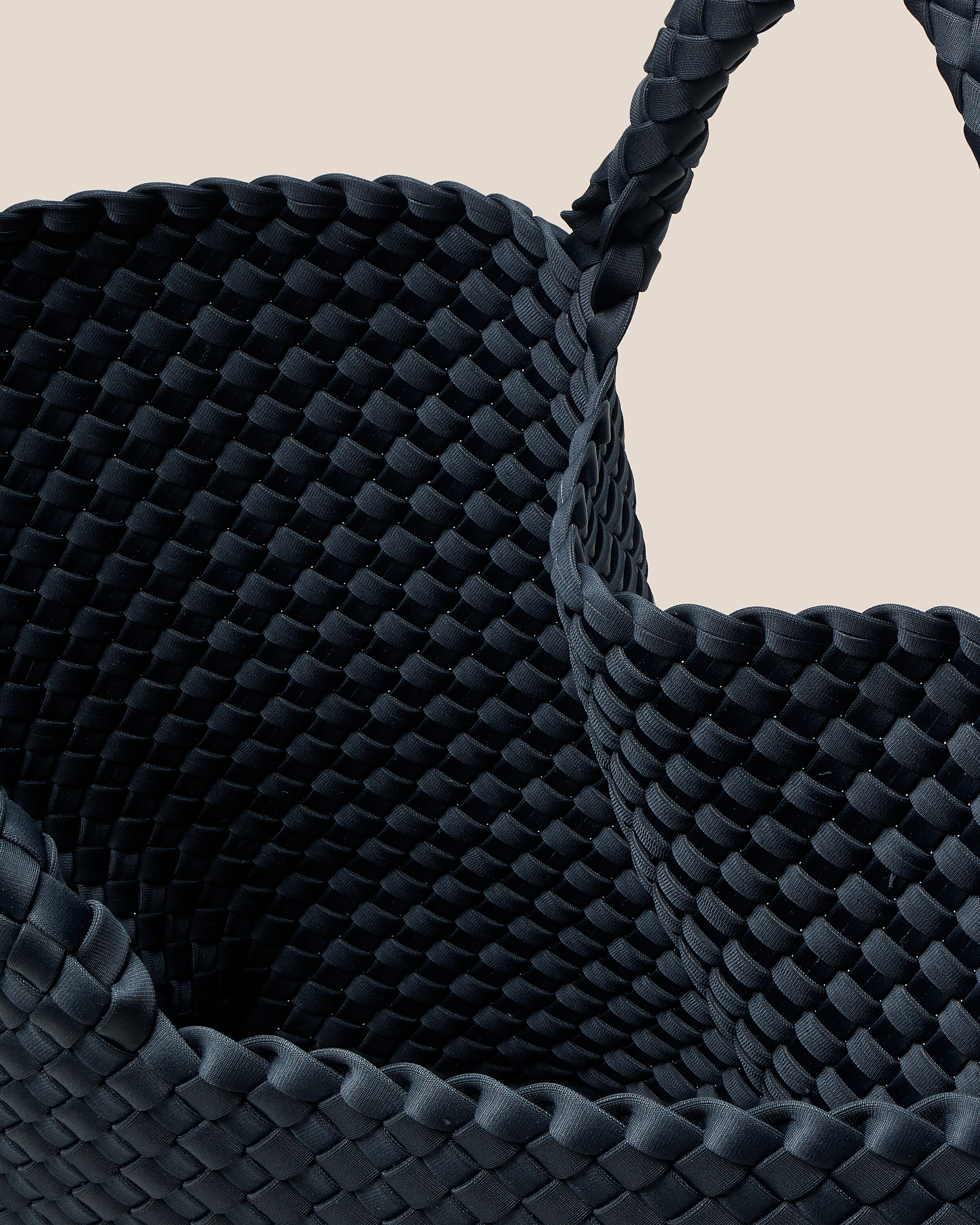 Interior close-up of St. Barths Tote in Murano showing its open top, and unlined interior.