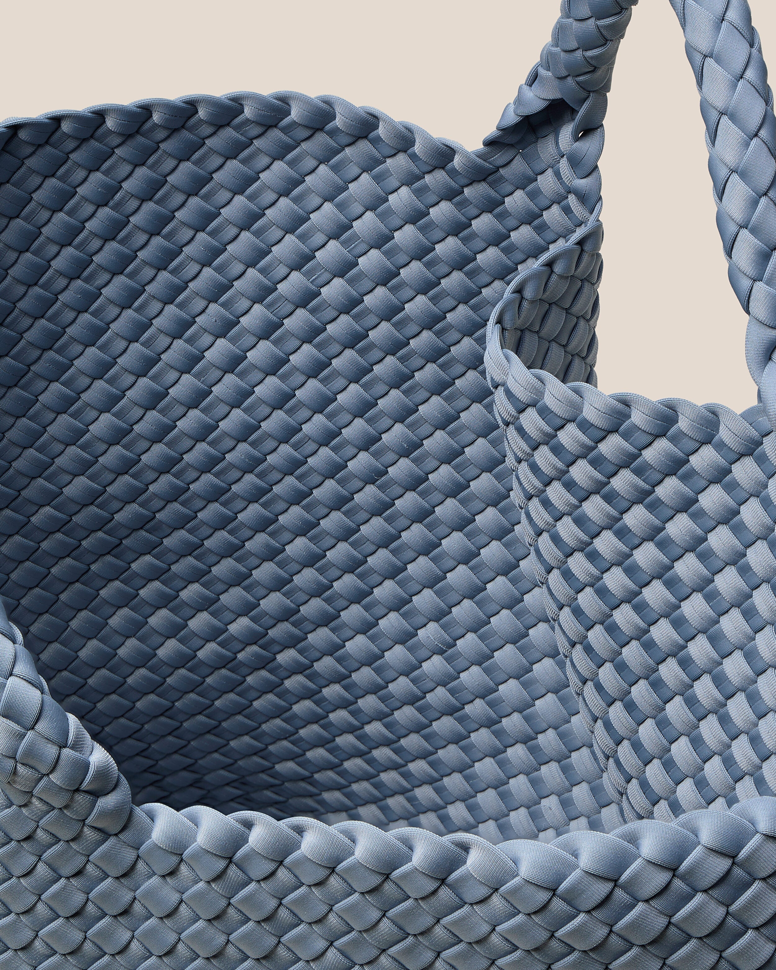 Interior close-up of St. Barths Tote in Nova showing its open top, and unlined interior.