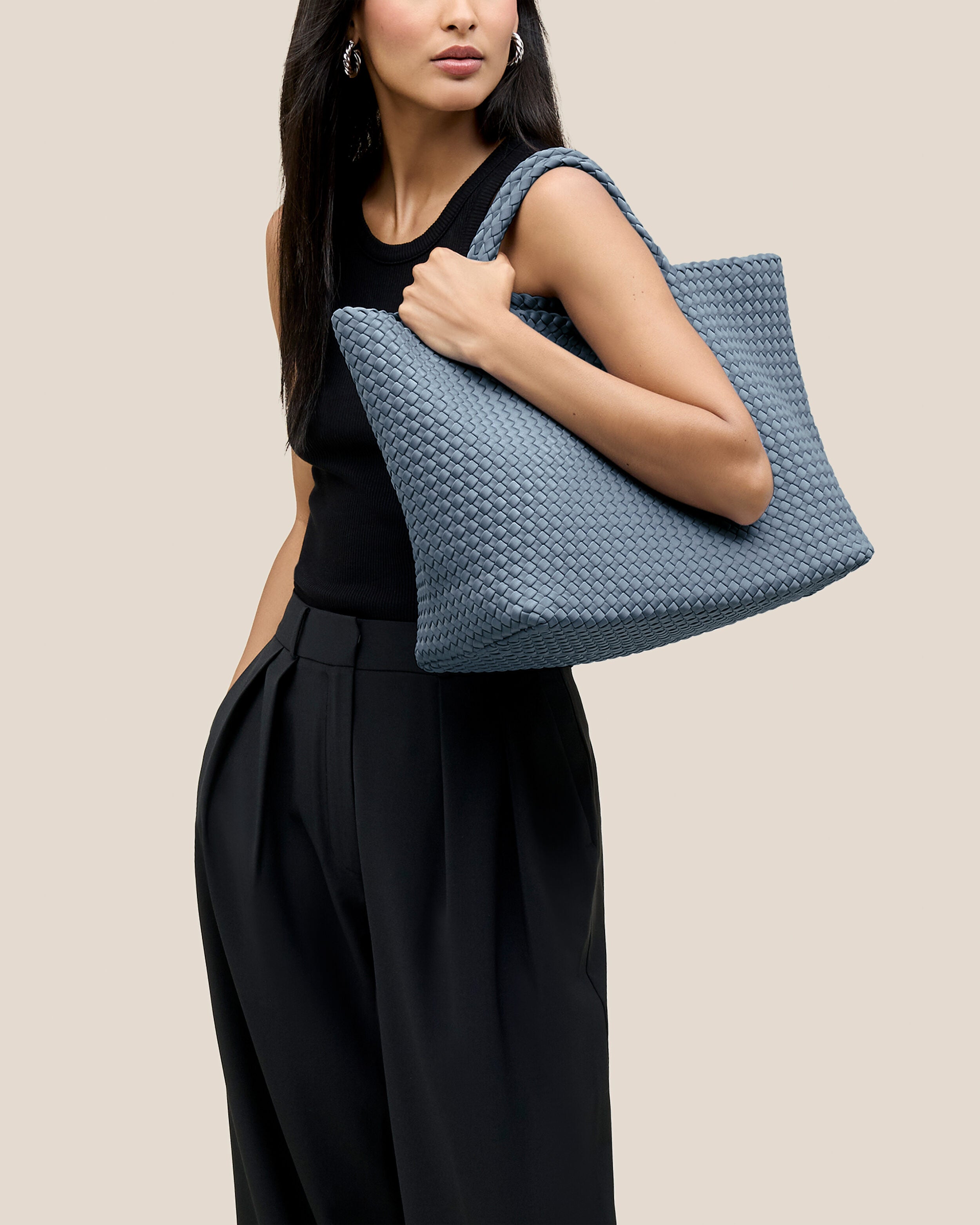 St. Barths Tote in Nova shown on model to illustrate scale and soft silhouette.