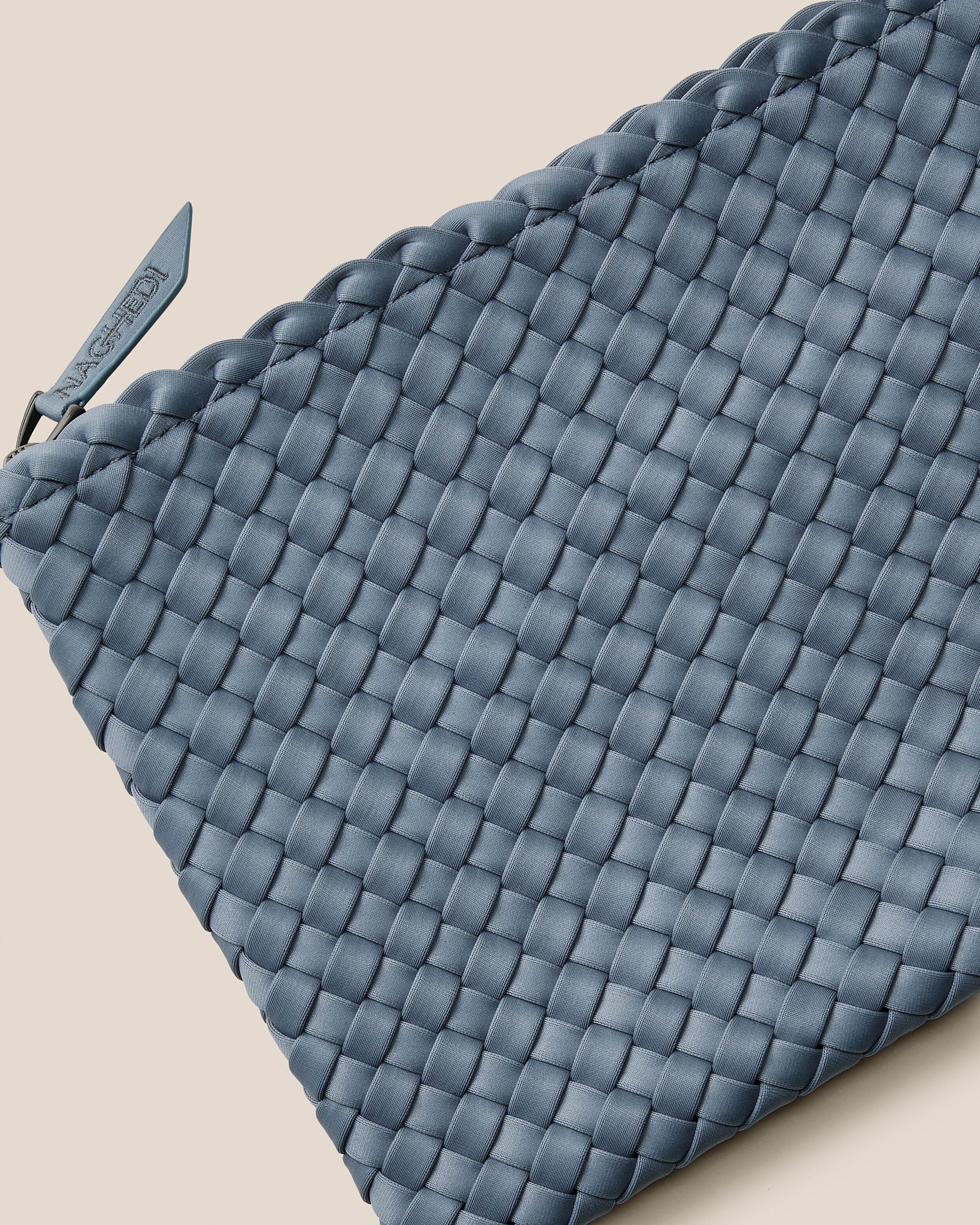 Close-up of included matching woven zippered pouch.